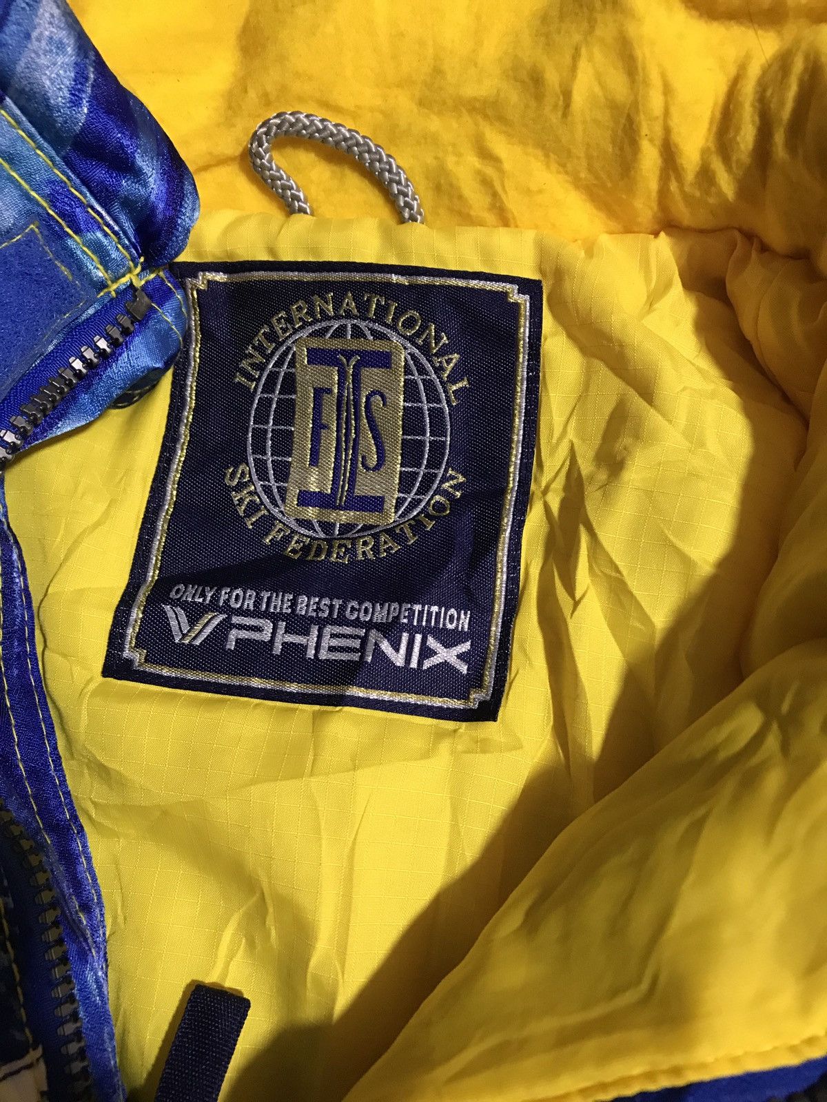 Japanese Brand Vintage Phenix Ski Jacket Japan Blue Yellow FIS Competition Size US L / EU 52-54 / 3 - 9 Thumbnail
