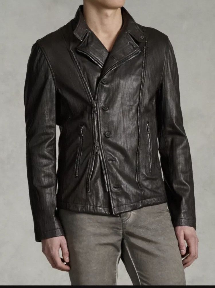 Asymmetrical biker jacket. 48
