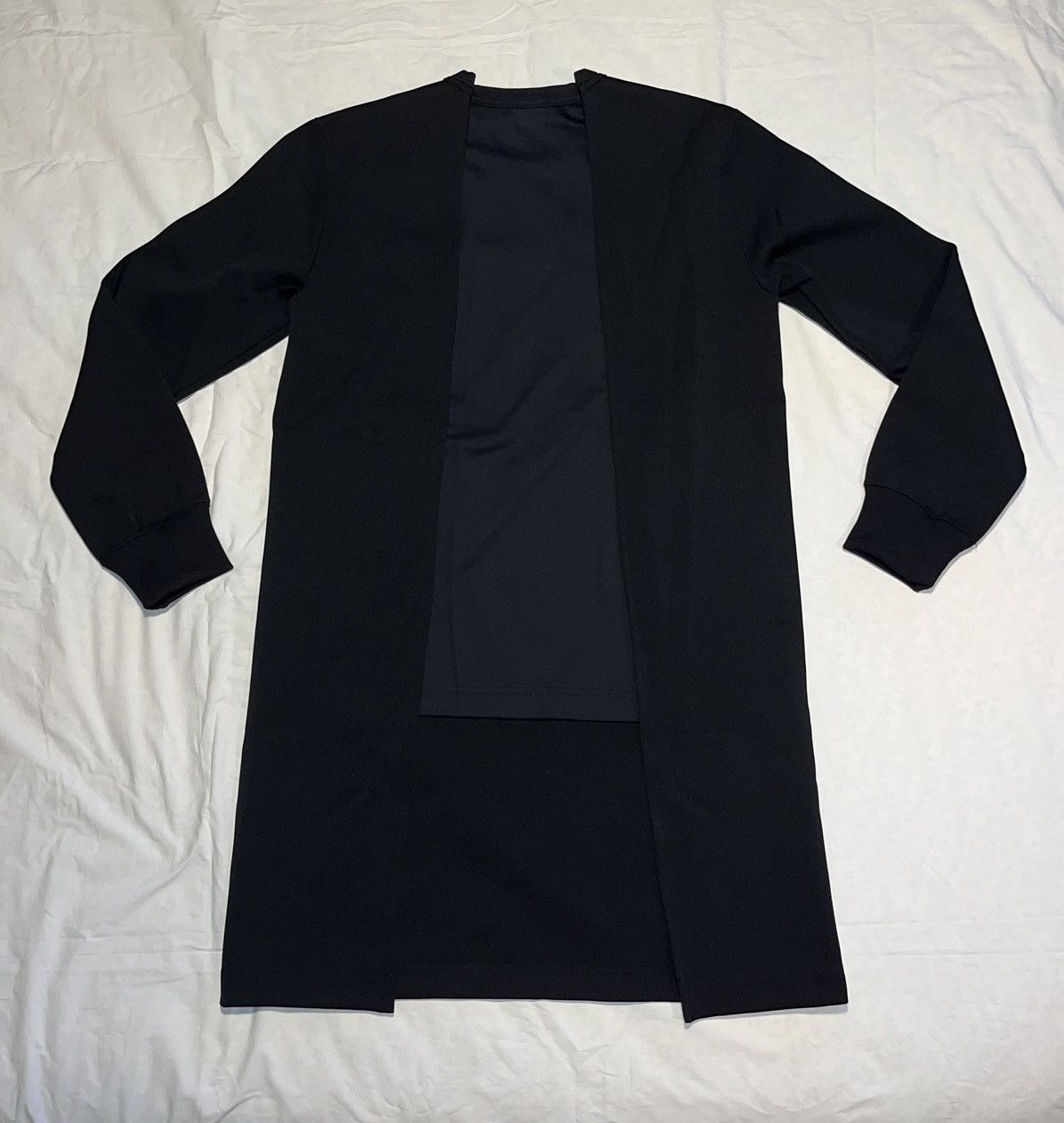 Comme des Garçons Homme Plus black sweatshirt with blue tee.