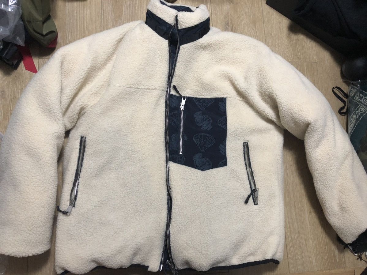 BBC wireframe diamonds and dollars reversible puffer