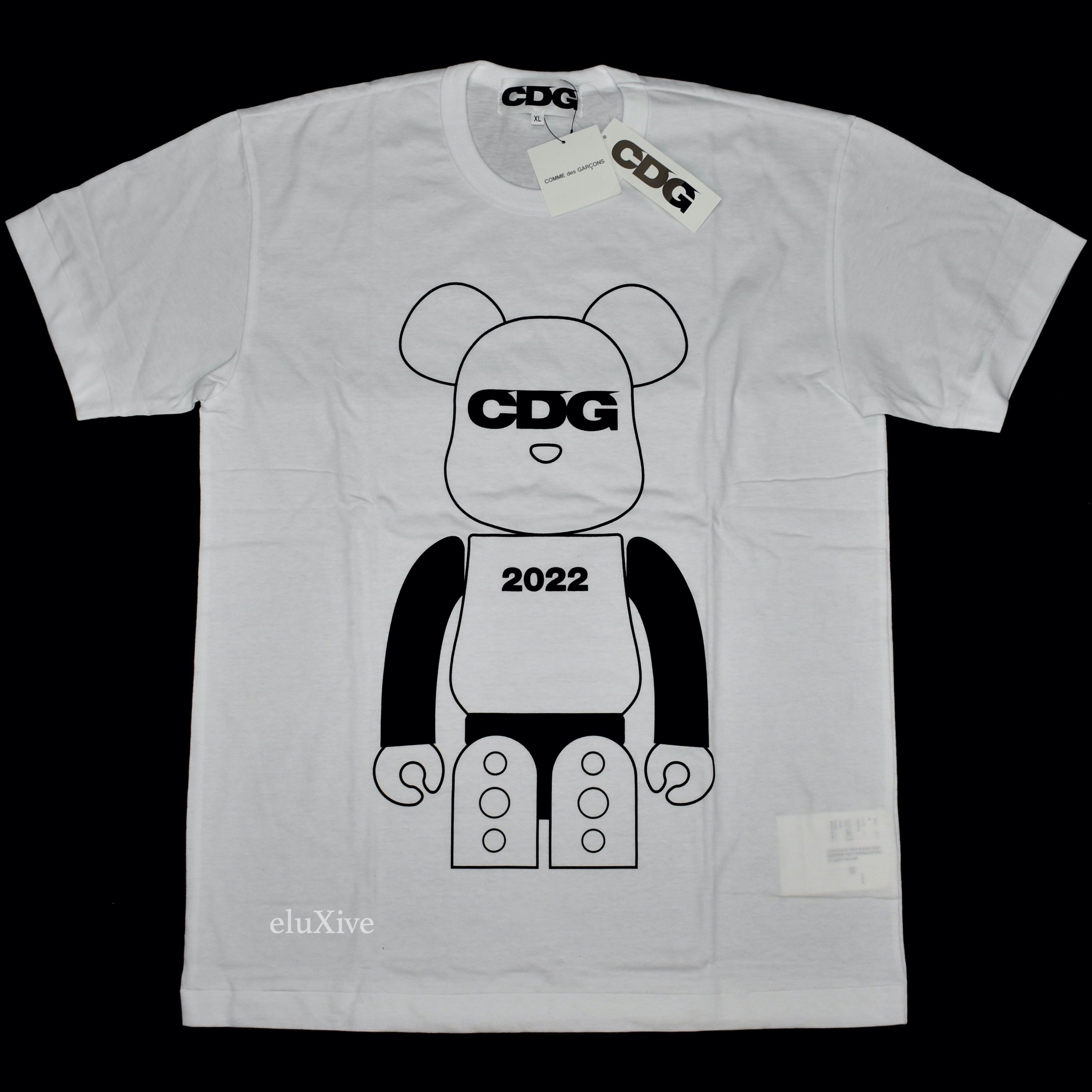 S 新品CDG 1986 été Tシャツ COMME des GARCONS A CDG Grail Lives On as a Brilliantly Simple Graphic Tee