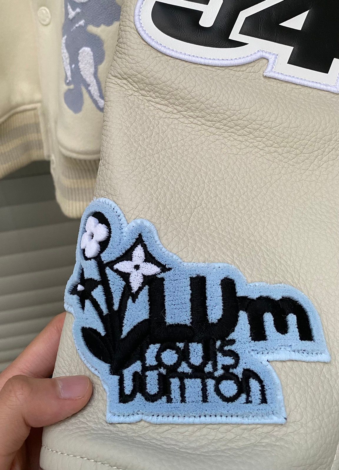 Louis Vuitton FW22 Cream Patched Bunny Varsity Jacket