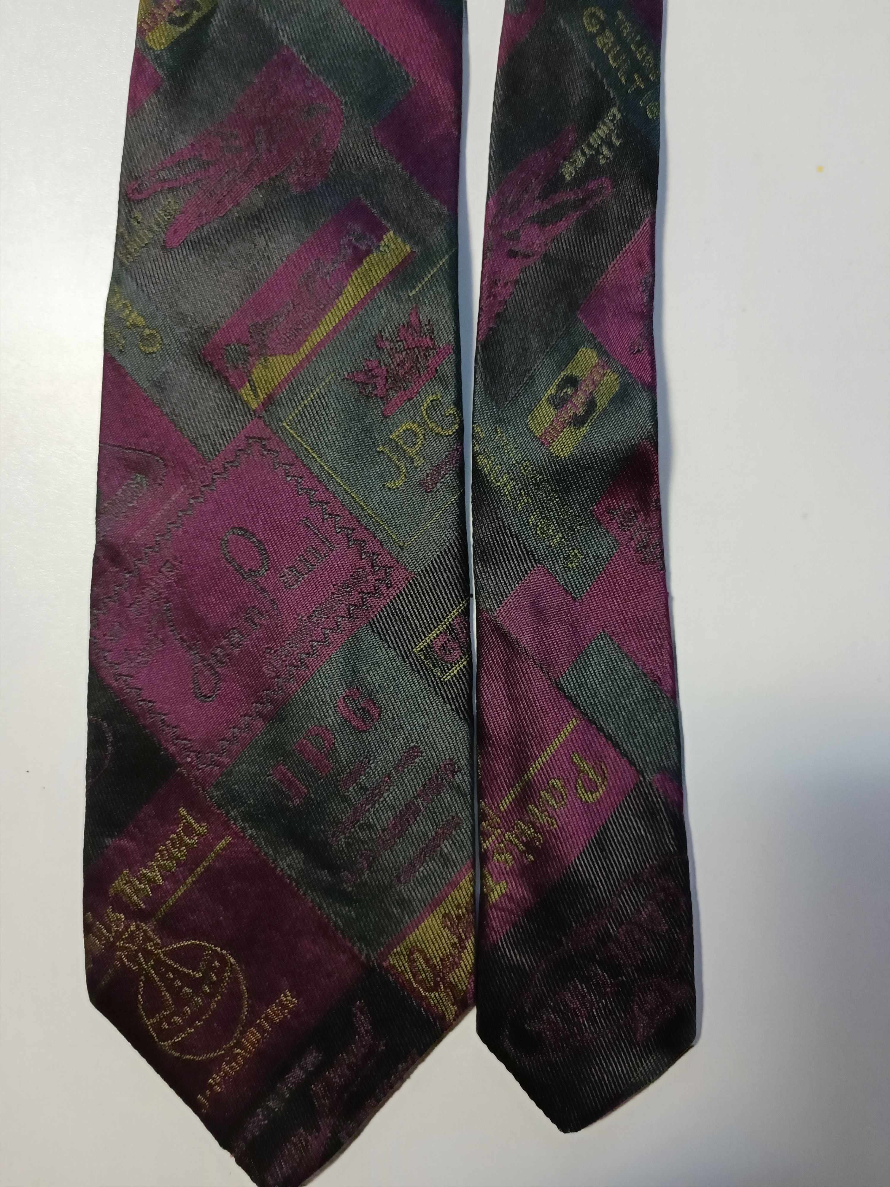 Multilogo silk tie in purple olive and dark grey.