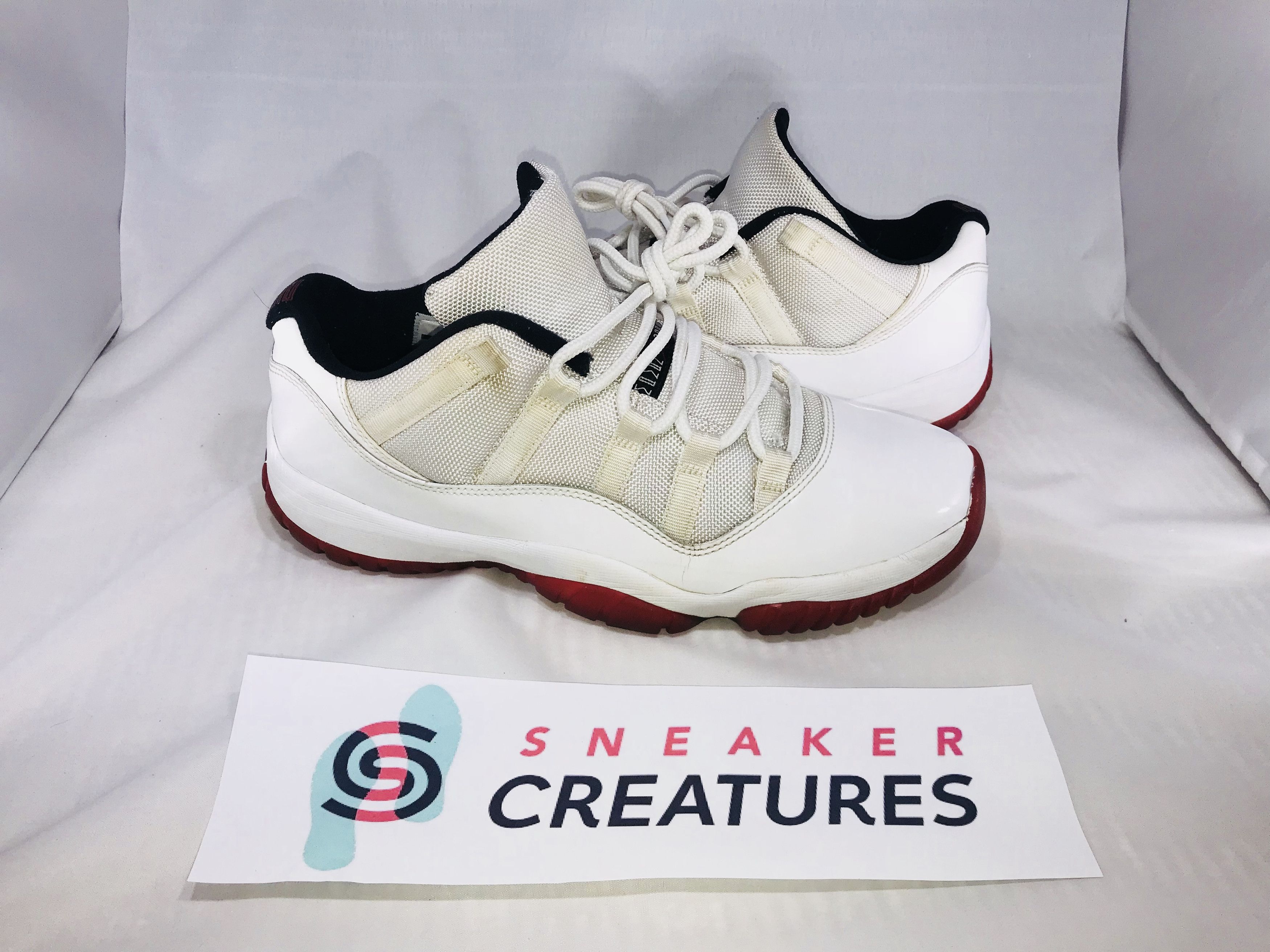 image of Jordan Brand 11 Cherry Low Size 10 Shoes in White, Men's