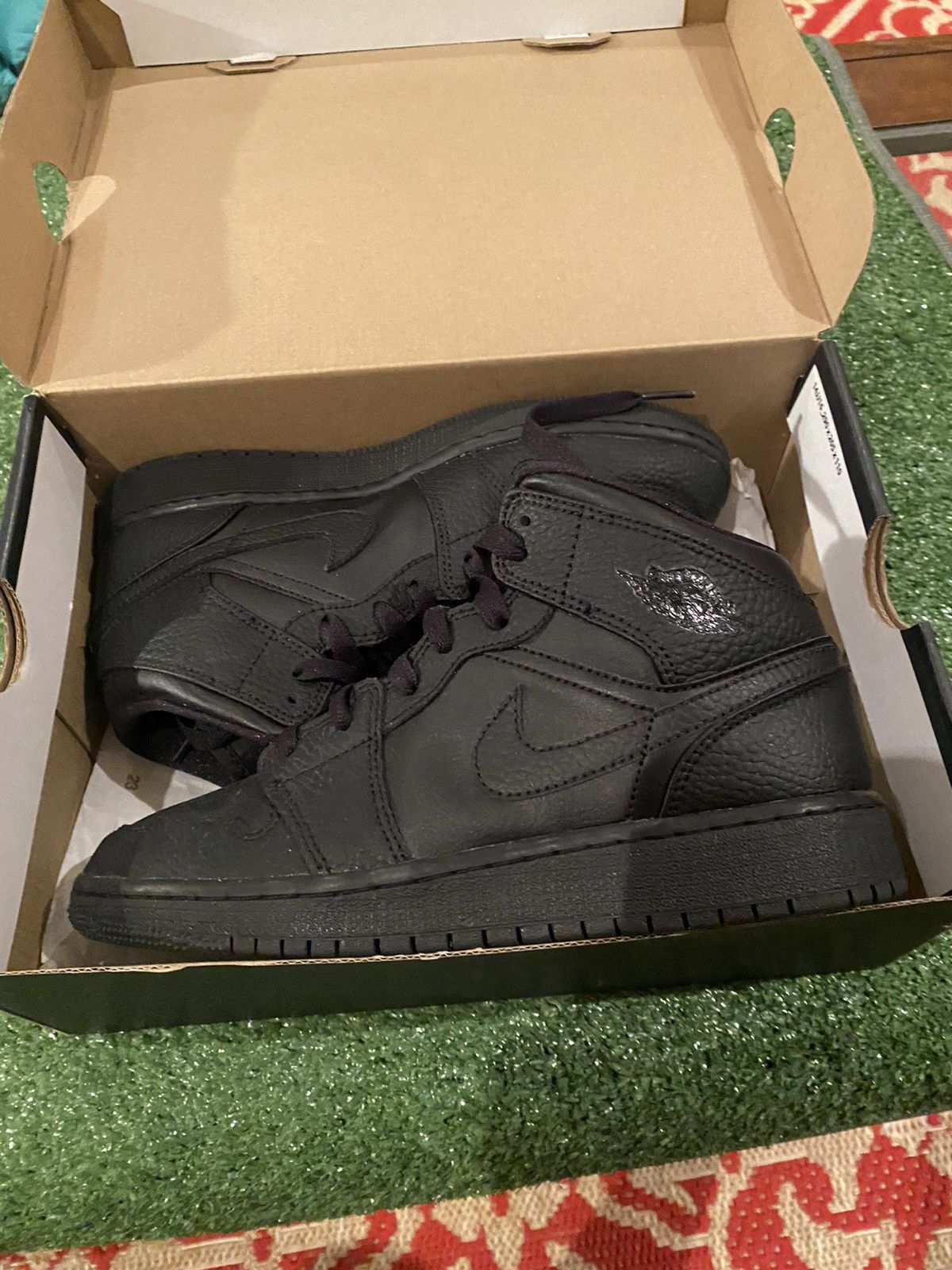 Jordan 1 Mid Black