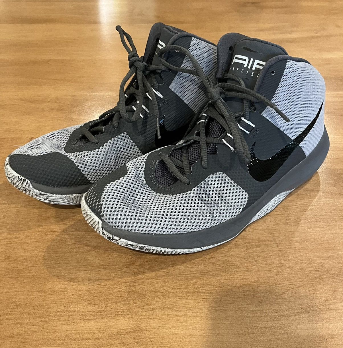 Gently used Nike “air-precision” basketball shoes