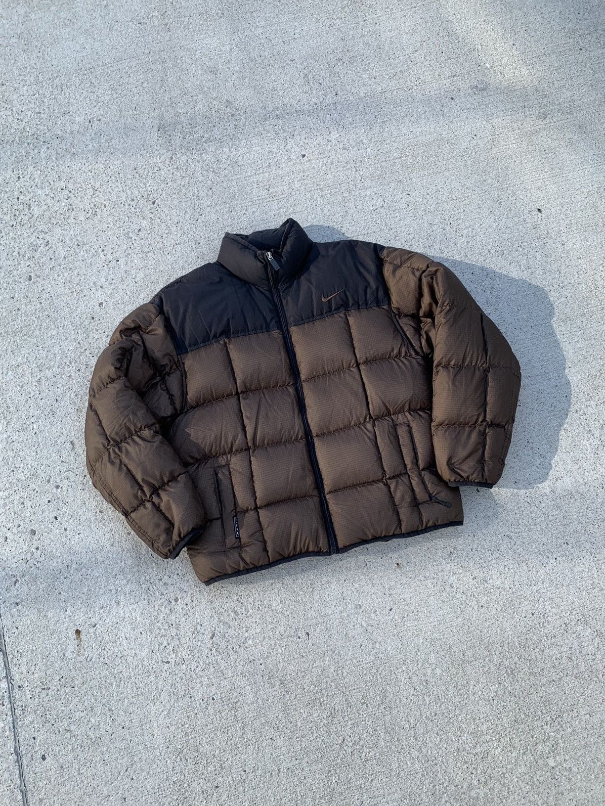 Vintage brown Nike puffer offers jacket