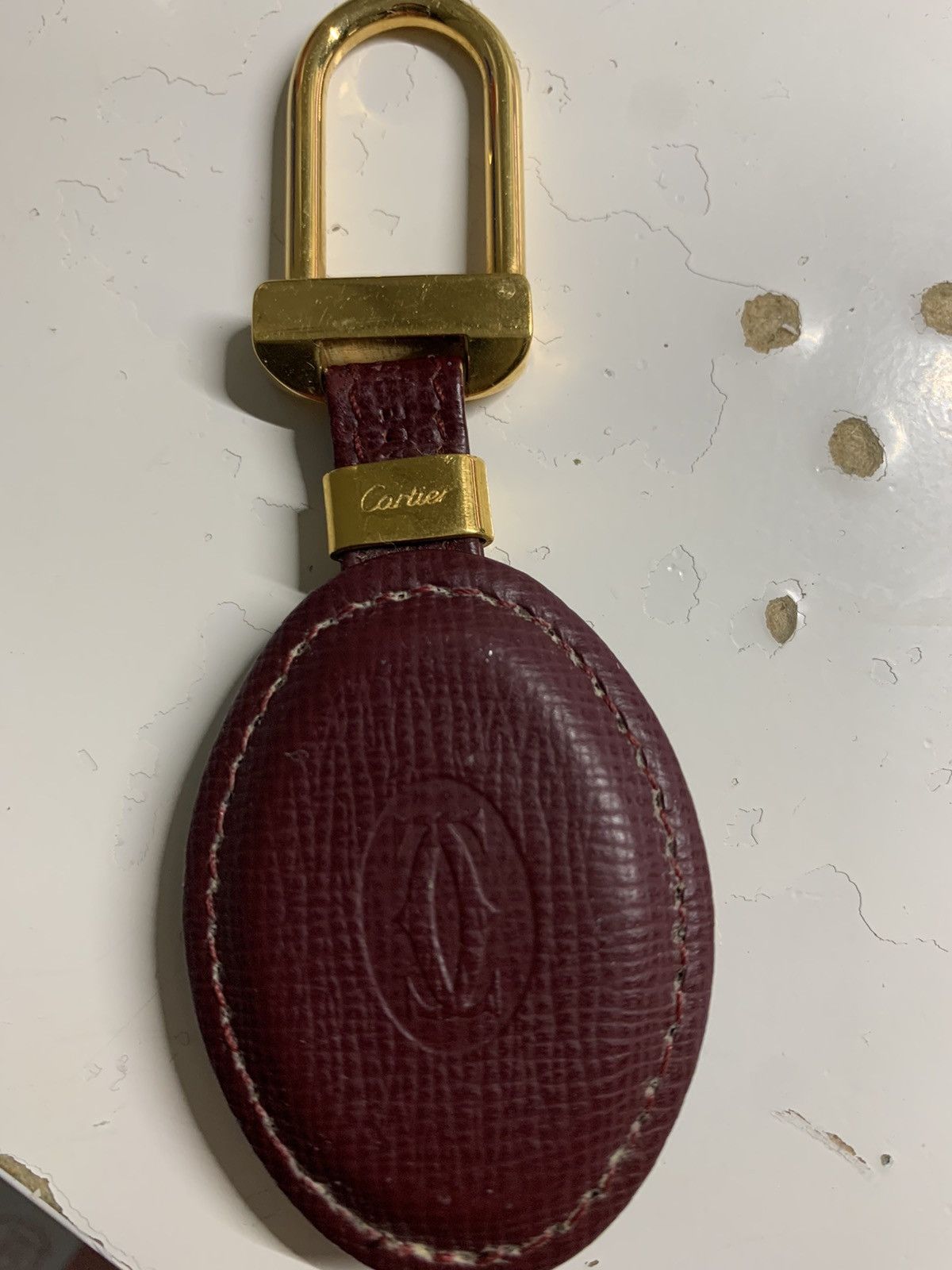 Cartier Cartier key ring with letter tag logo | Grailed