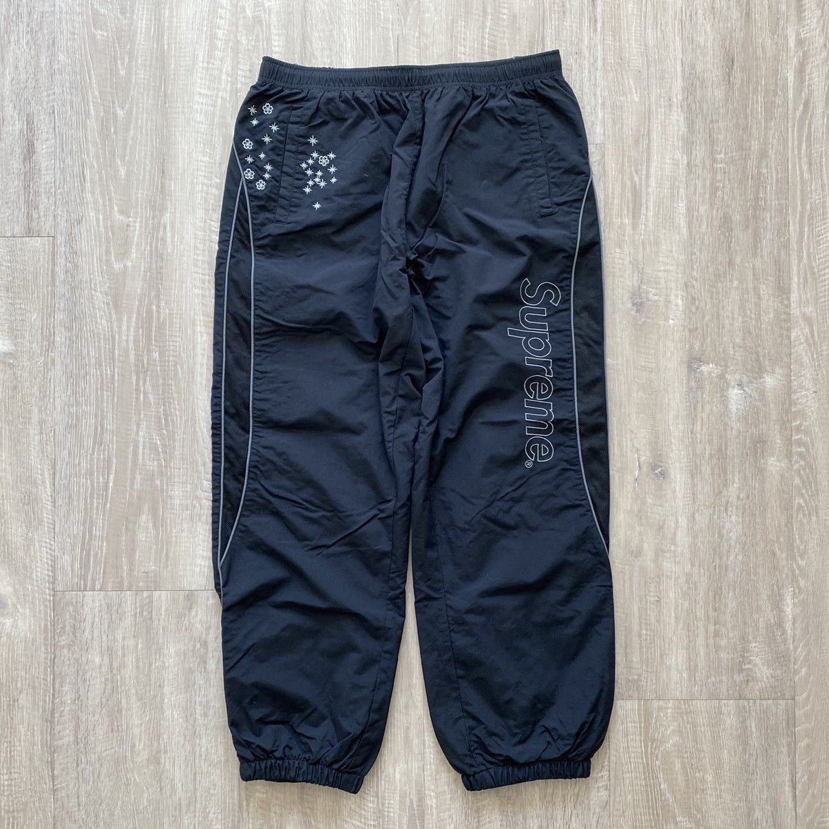 aoi + supreme glow in the dark track pant