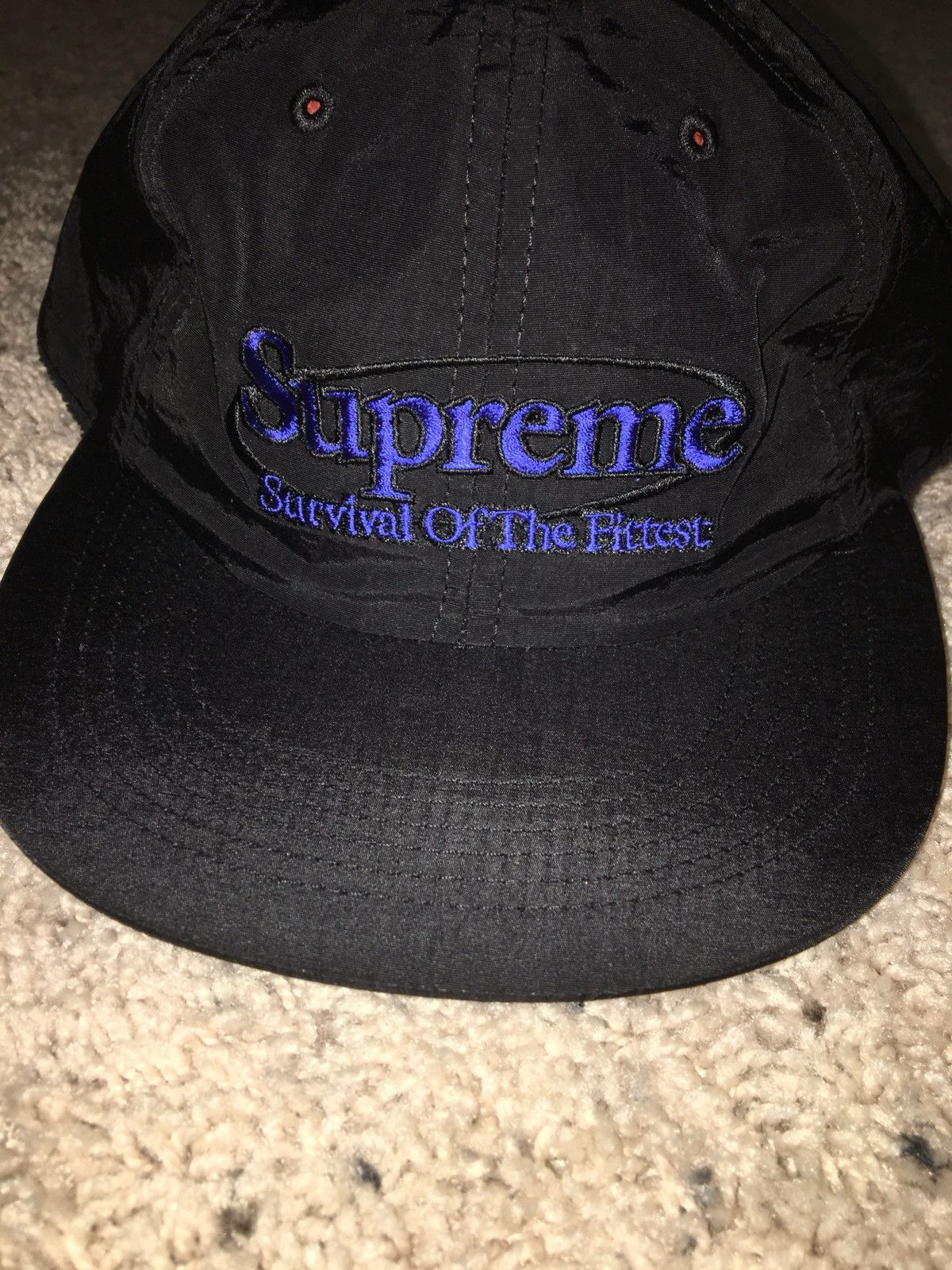 Supreme survival of shop the fittest hat