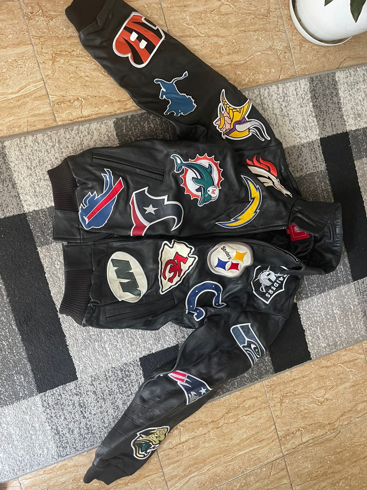 NFL Vintage nfl leather jacket all teams patches | Grailed