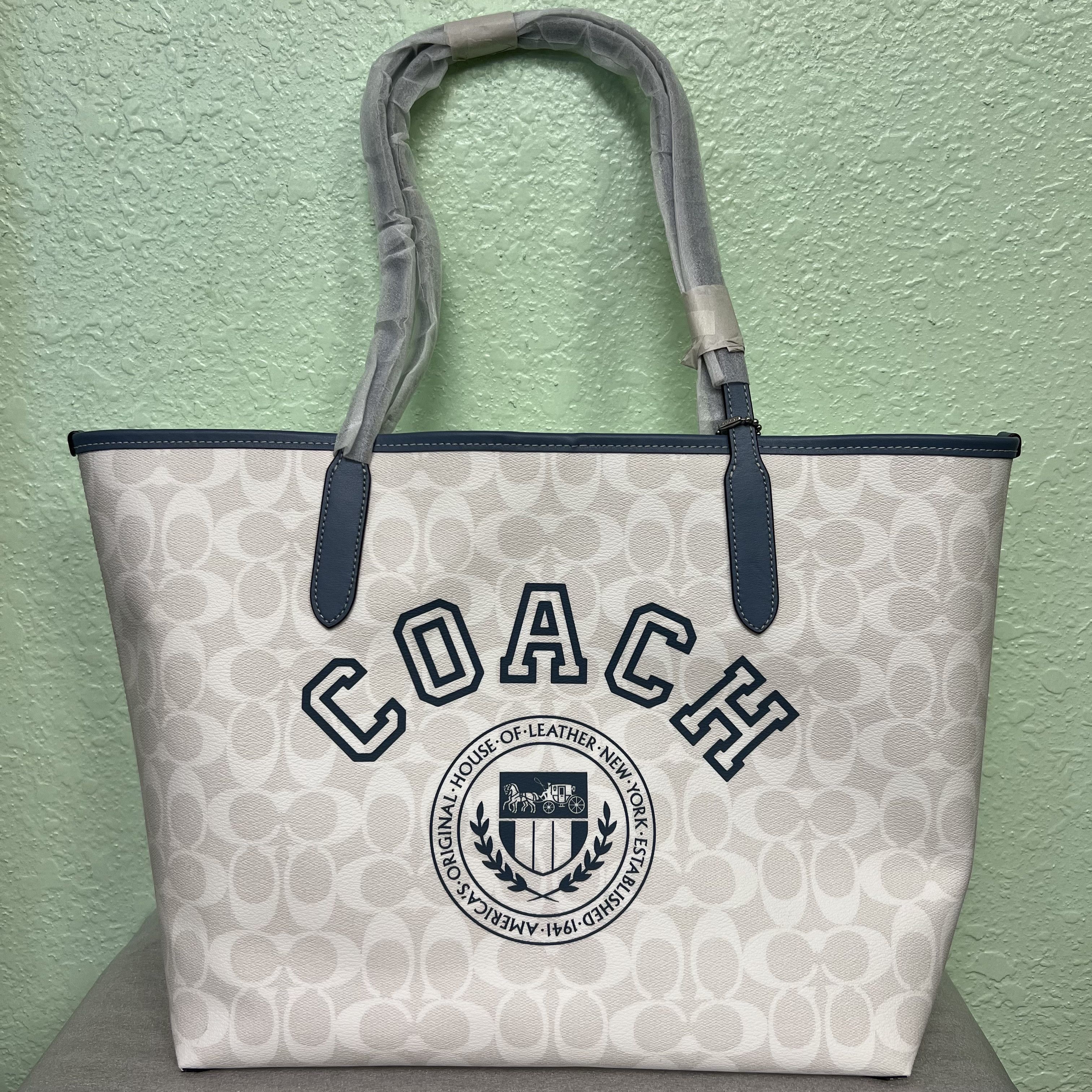 City Tote In Signature Canvas With Varsity Motif