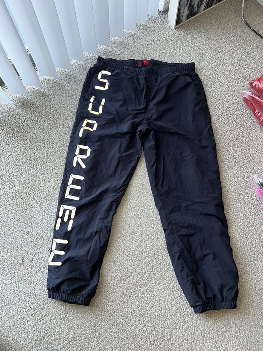 Supreme digital best sale logo track pants