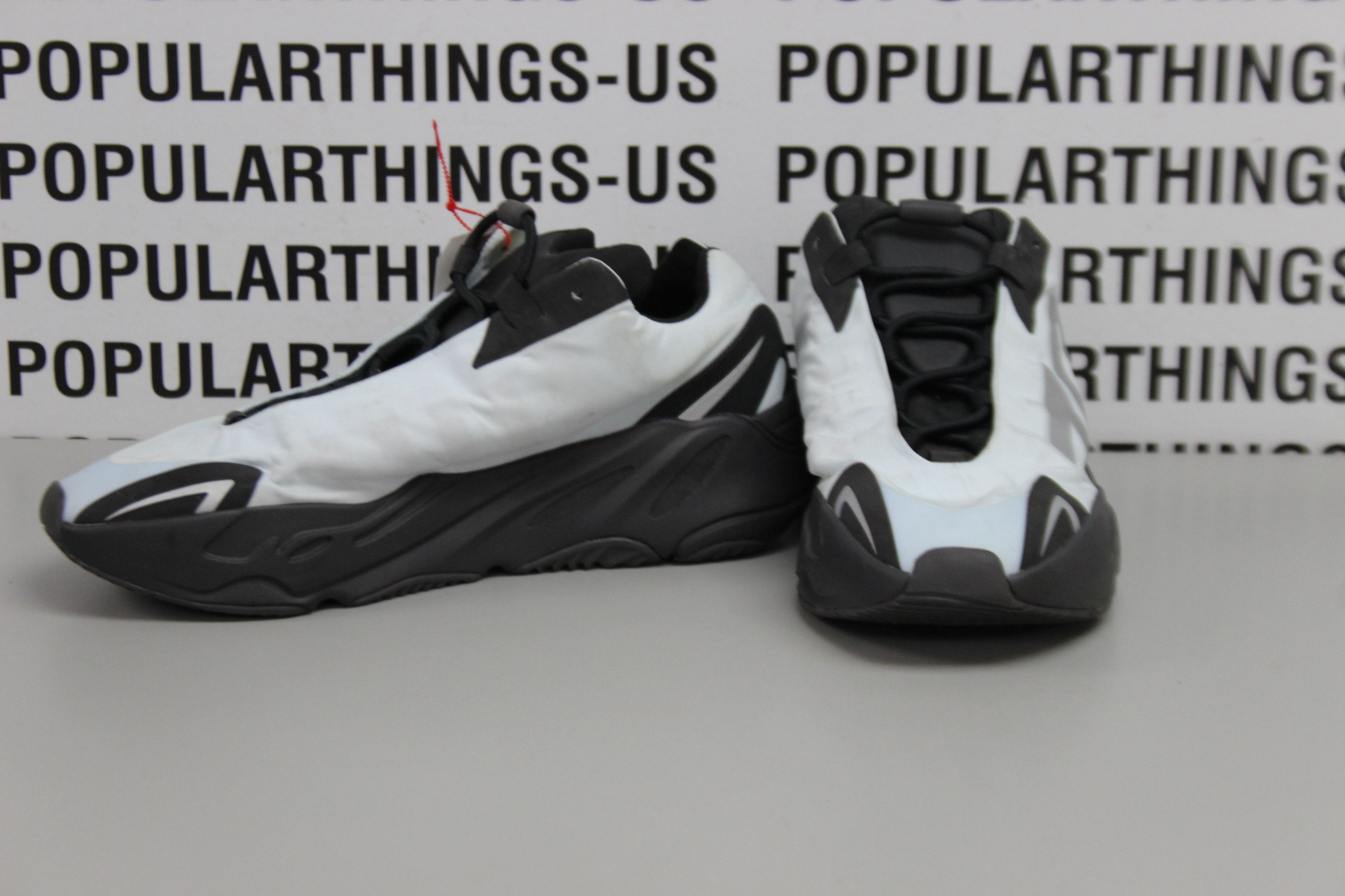 yeezy 700 mnvn blue tint on feet