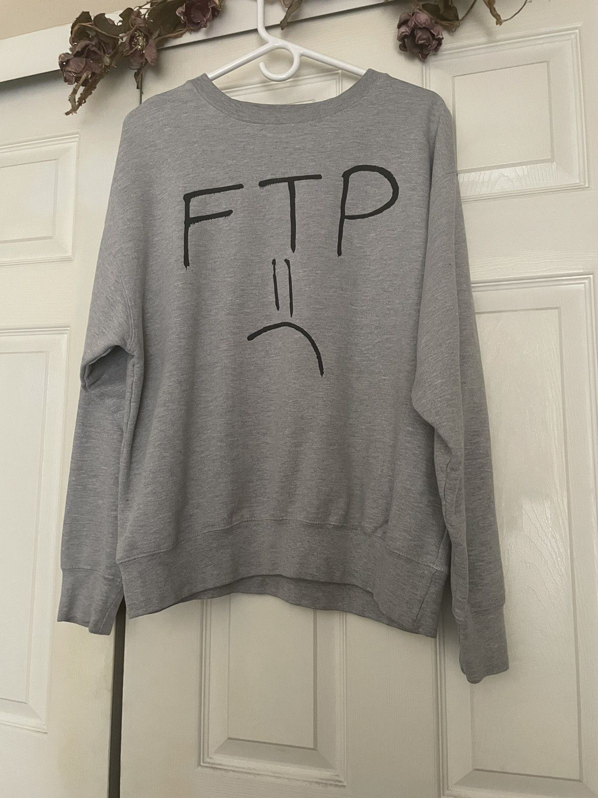 Sad face sweater outlet