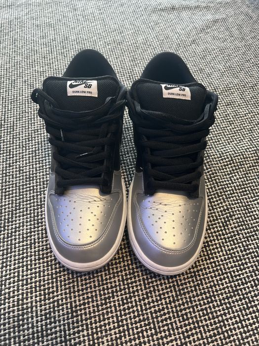 sb dunk low supreme jewel swoosh silver