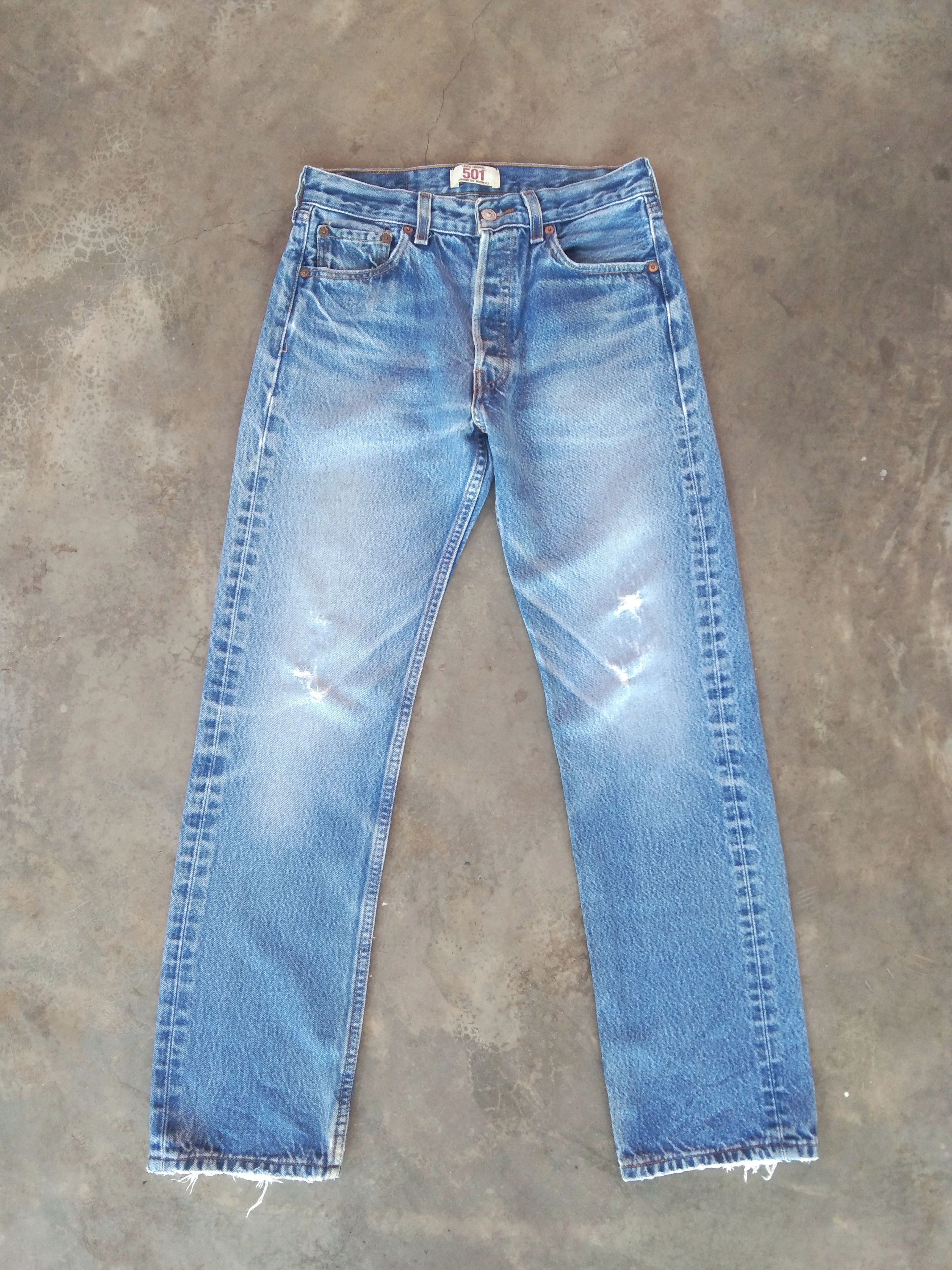 Vintage Vintage Levi's 501 Light Wash Distressed Jeans 28x30 | Grailed