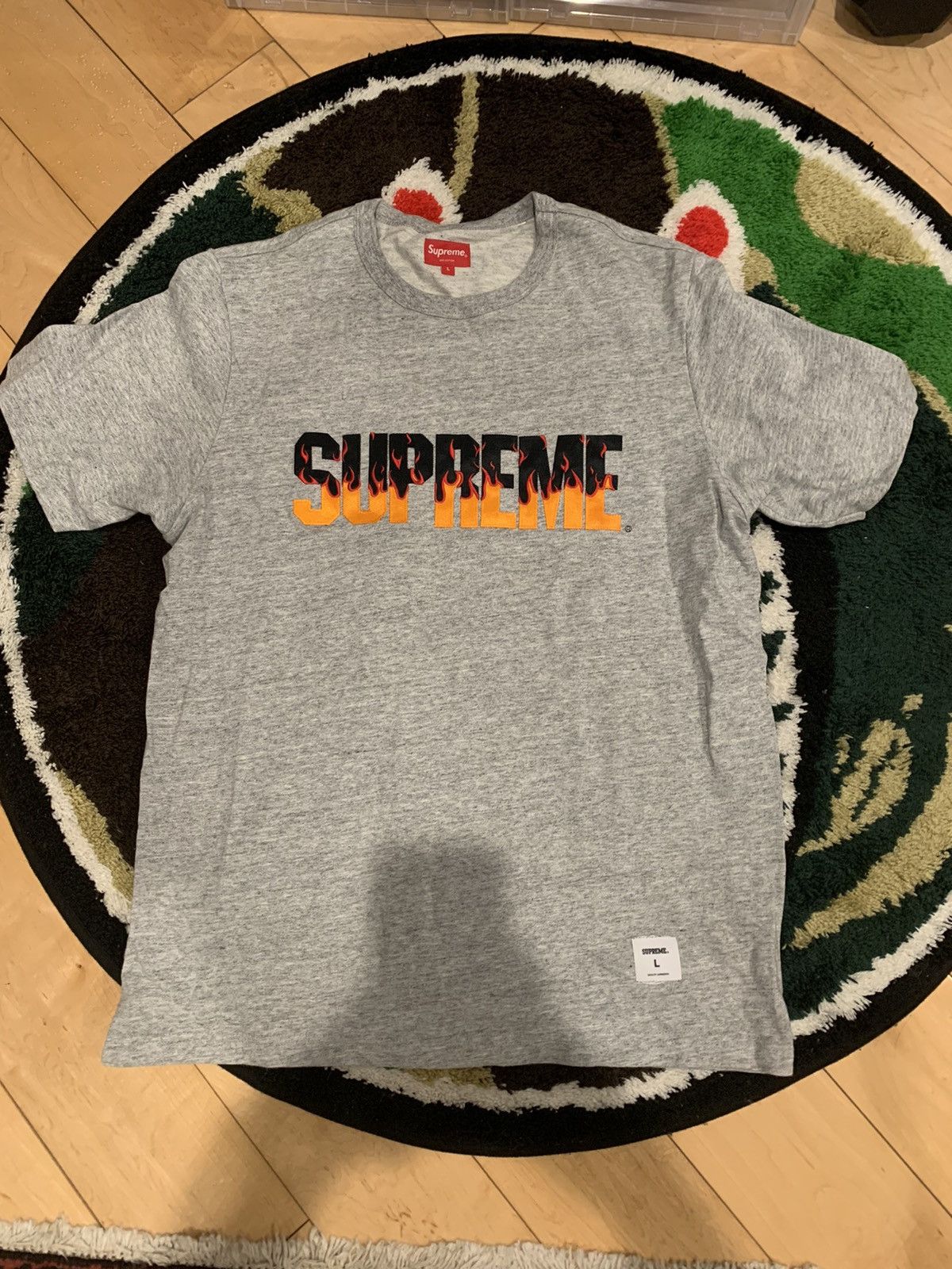 Supreme flame tee hotsell