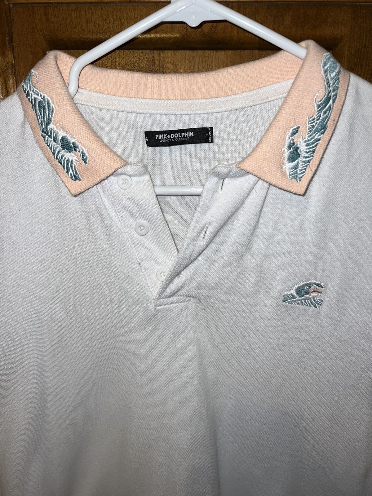 Pink dolphin polo hotsell