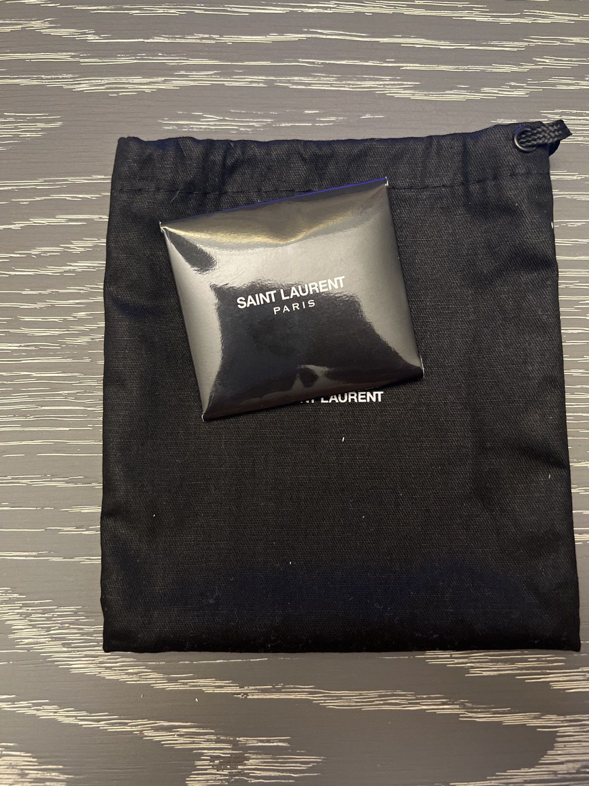 Saint Laurent condom