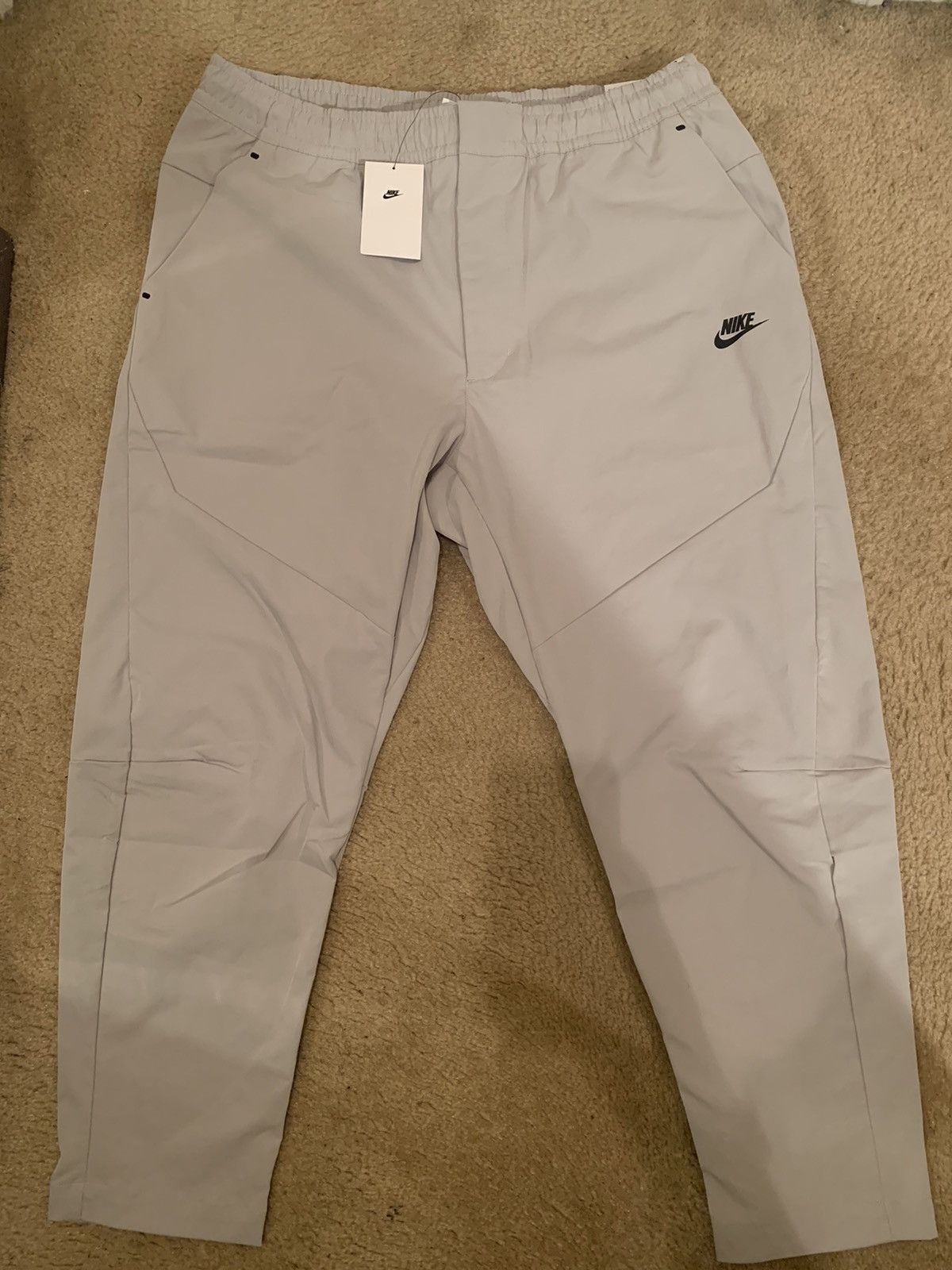 NEW NIKE SPORTSWEAR TECH ESSENTIAL UNLINED COMMUTER PANTS