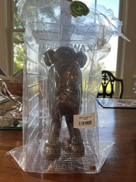 Kaws Kaws Small Lie Companion Vinyl Figure Black | Grailed