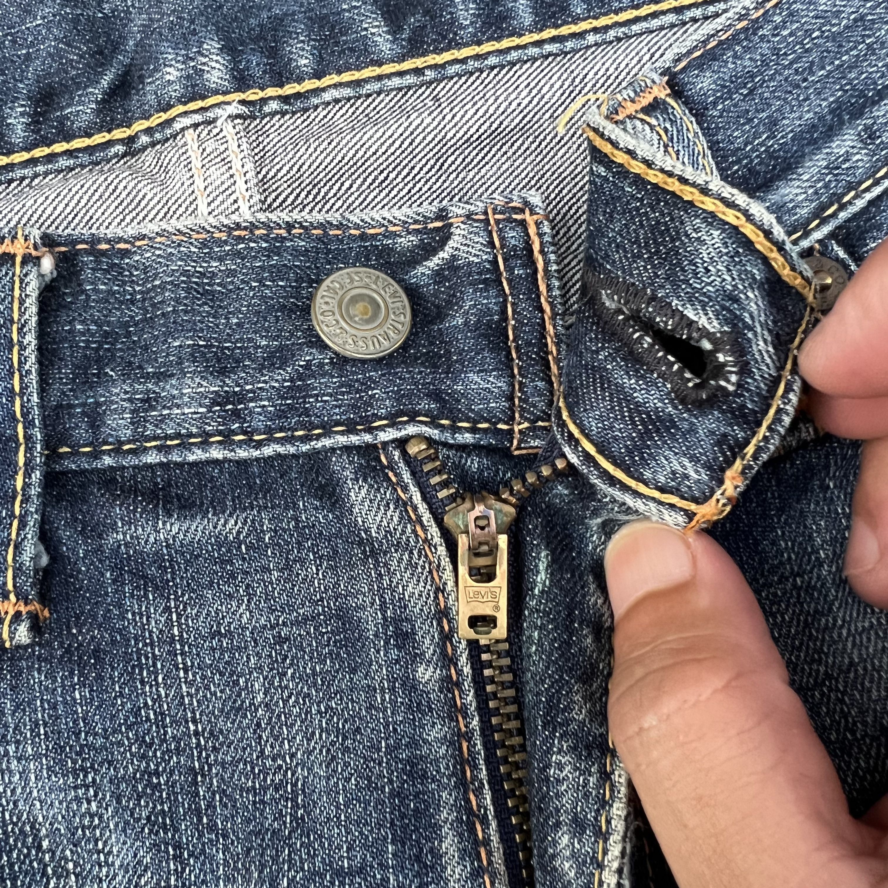 Vintage Levi's 702 Distressed Japanese Jeans Pants (W33)