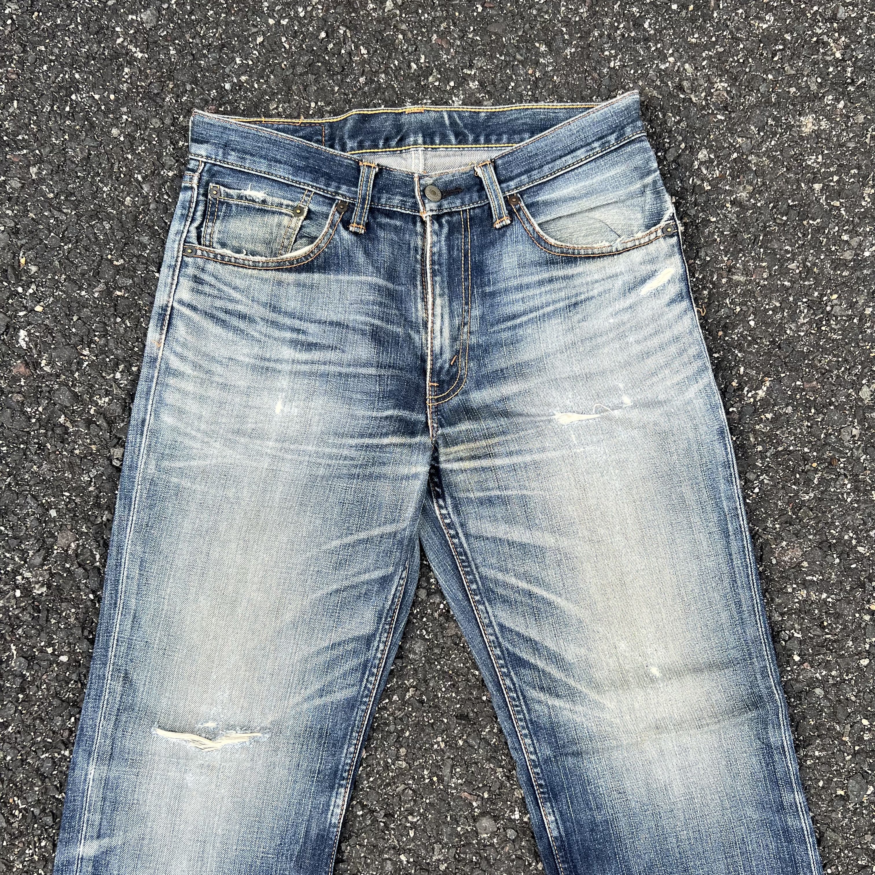 Vintage Levi's 702 Distressed Japanese Jeans Pants (W33)