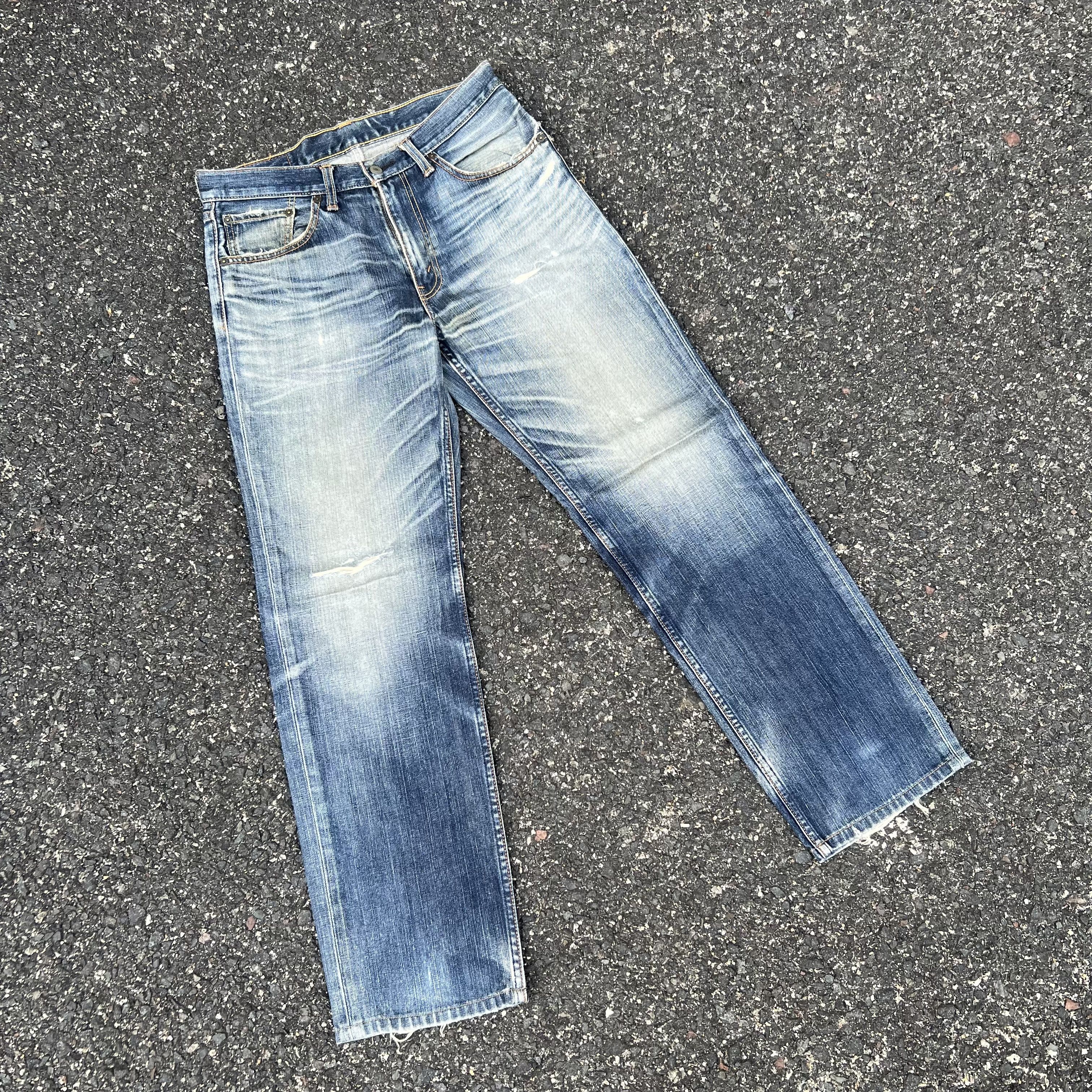 Vintage Levi's 702 Distressed Japanese Jeans Pants (W33)