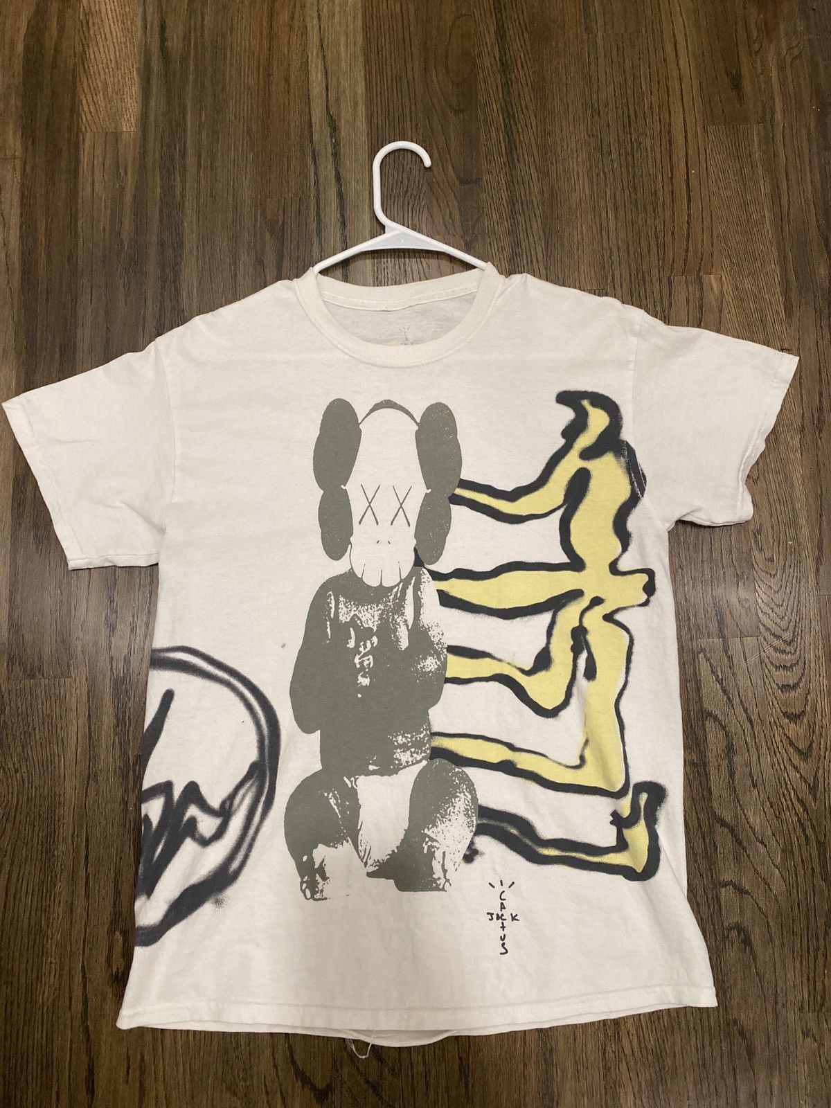 travis fragment kaws