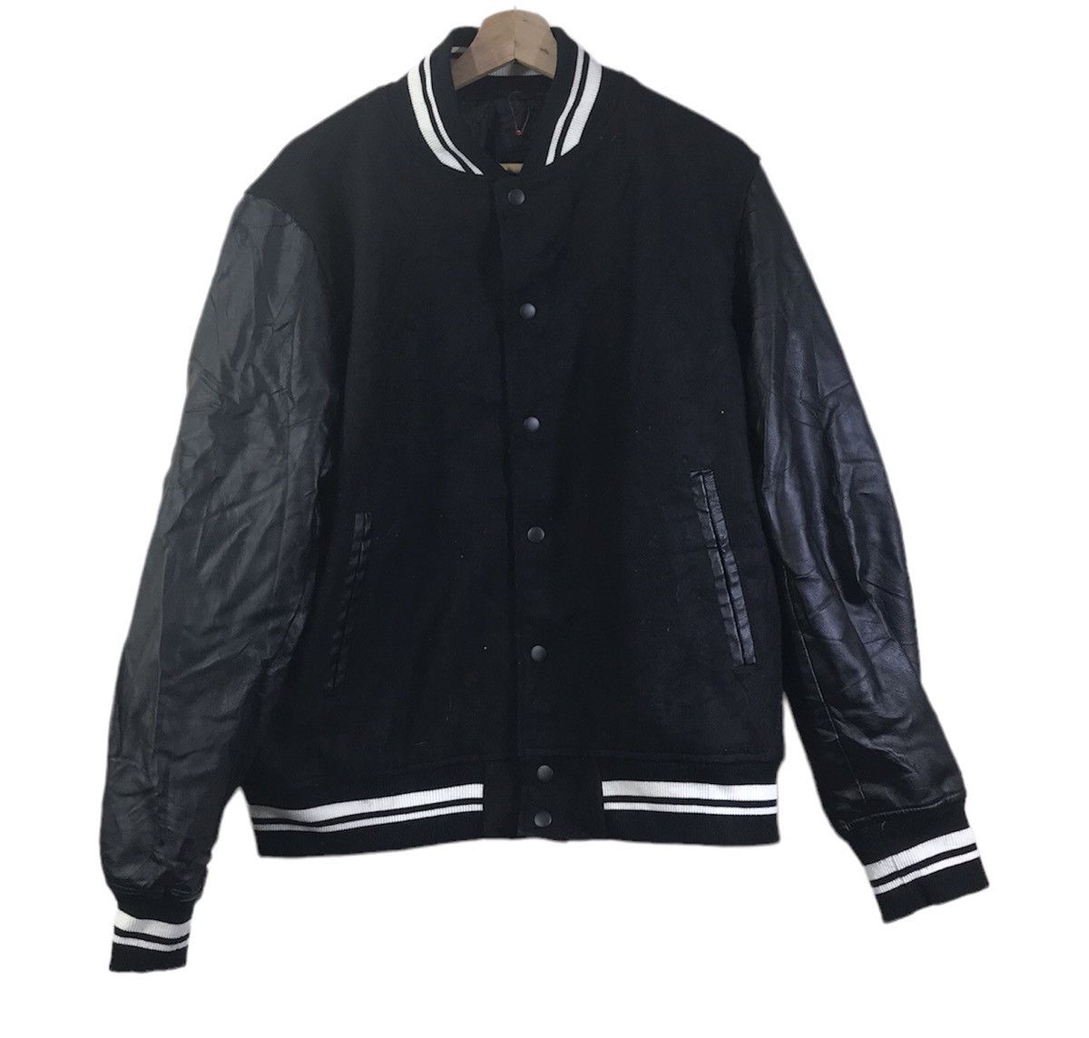 (528) gu x varsity jacket all black