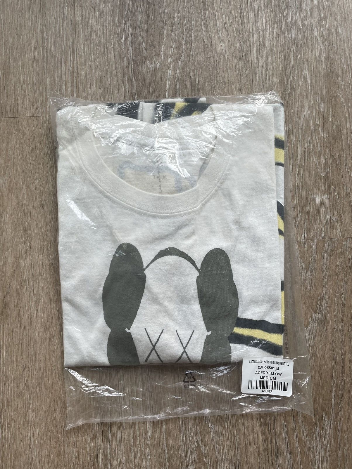travis scott kaws shirt