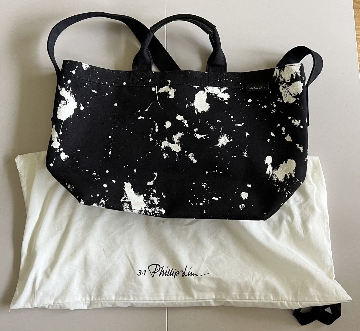 3.1 Phillip Lim Mens Black Paint Splatter Canvas Tote Bag
