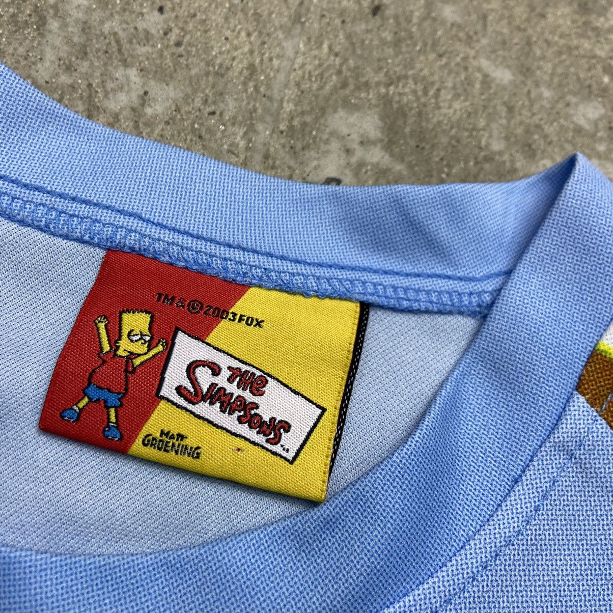 The Simpsons 2003 EL BARTO THE SIMPSONS CHAO BABY RARE JERSEY TEE - № 169 Size US L / EU 52-54 / 3 - 11 Thumbnail