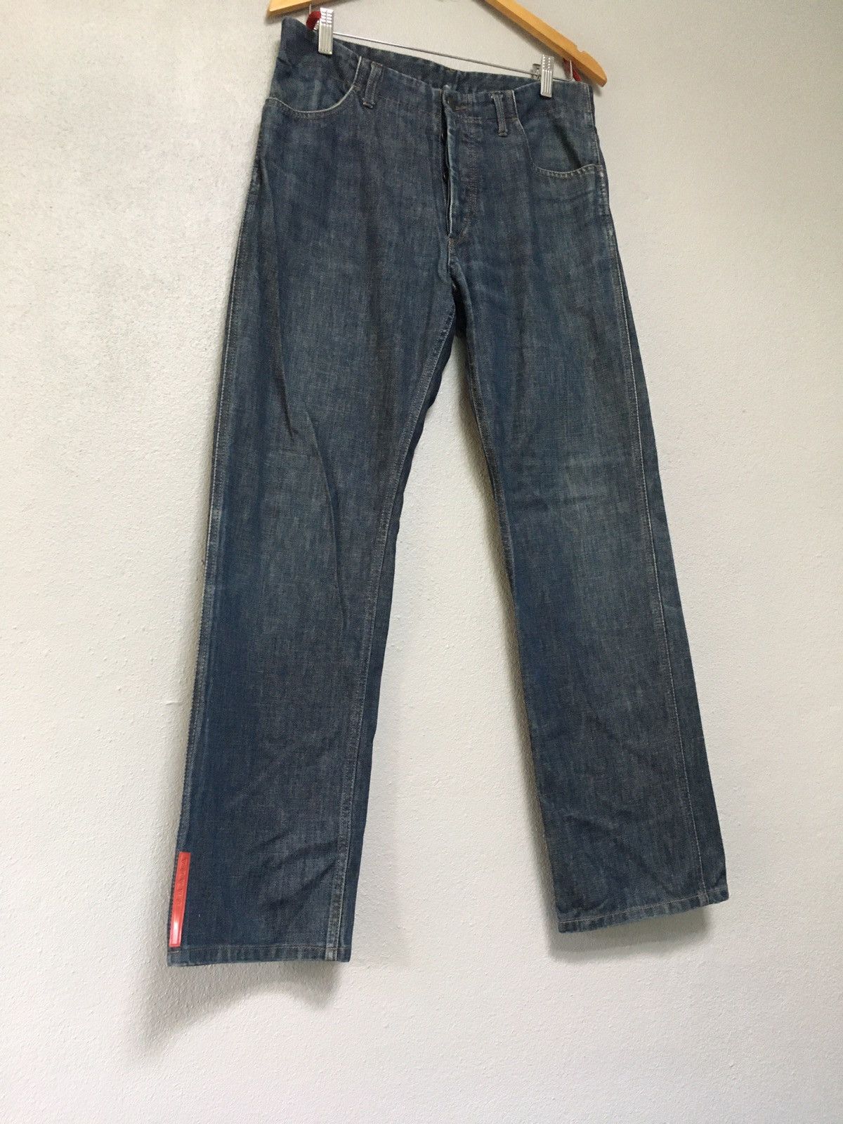 Prada rubber tags jeans