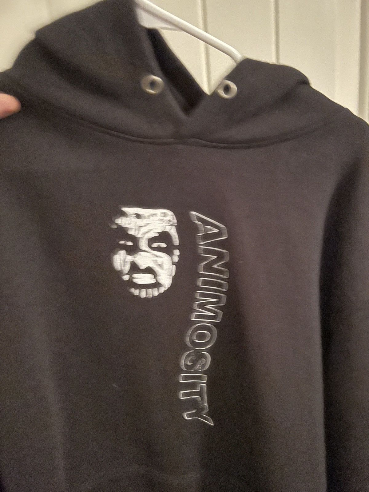 Black animosity pull over hoodie