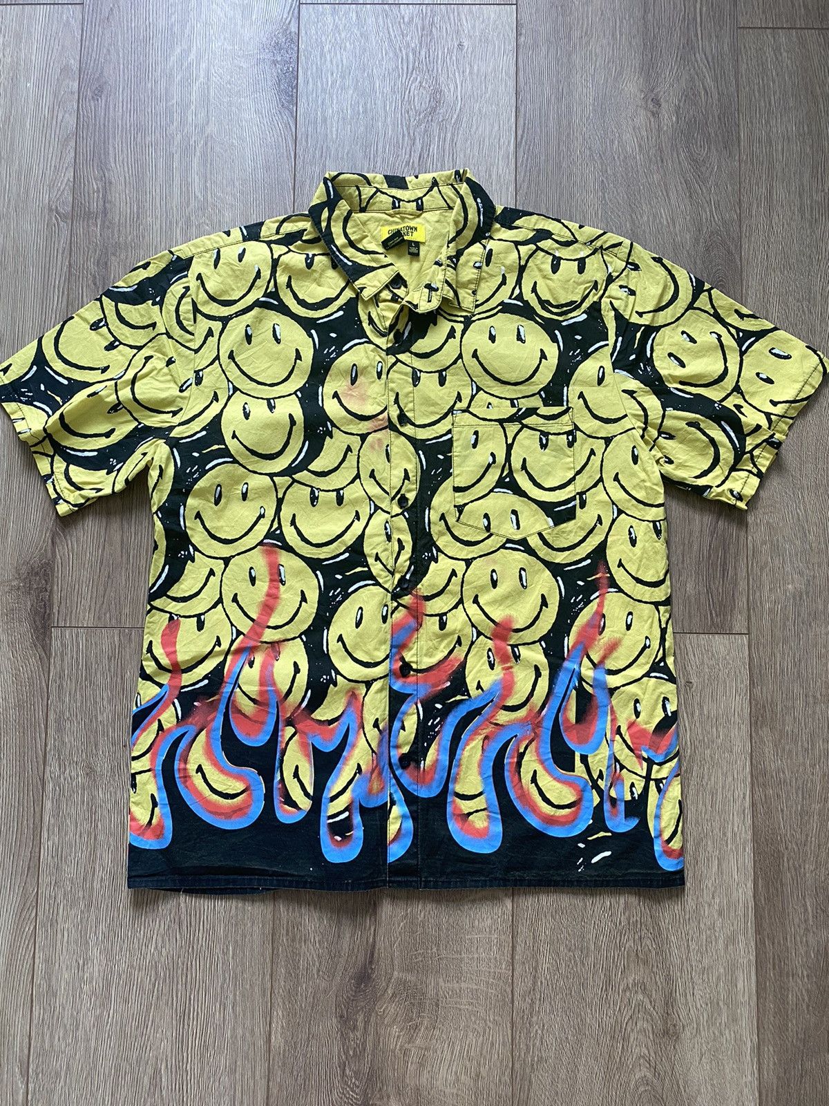 Shop Chinatown Market Smiley Flames SS Shirt Black/Yellow at itk 