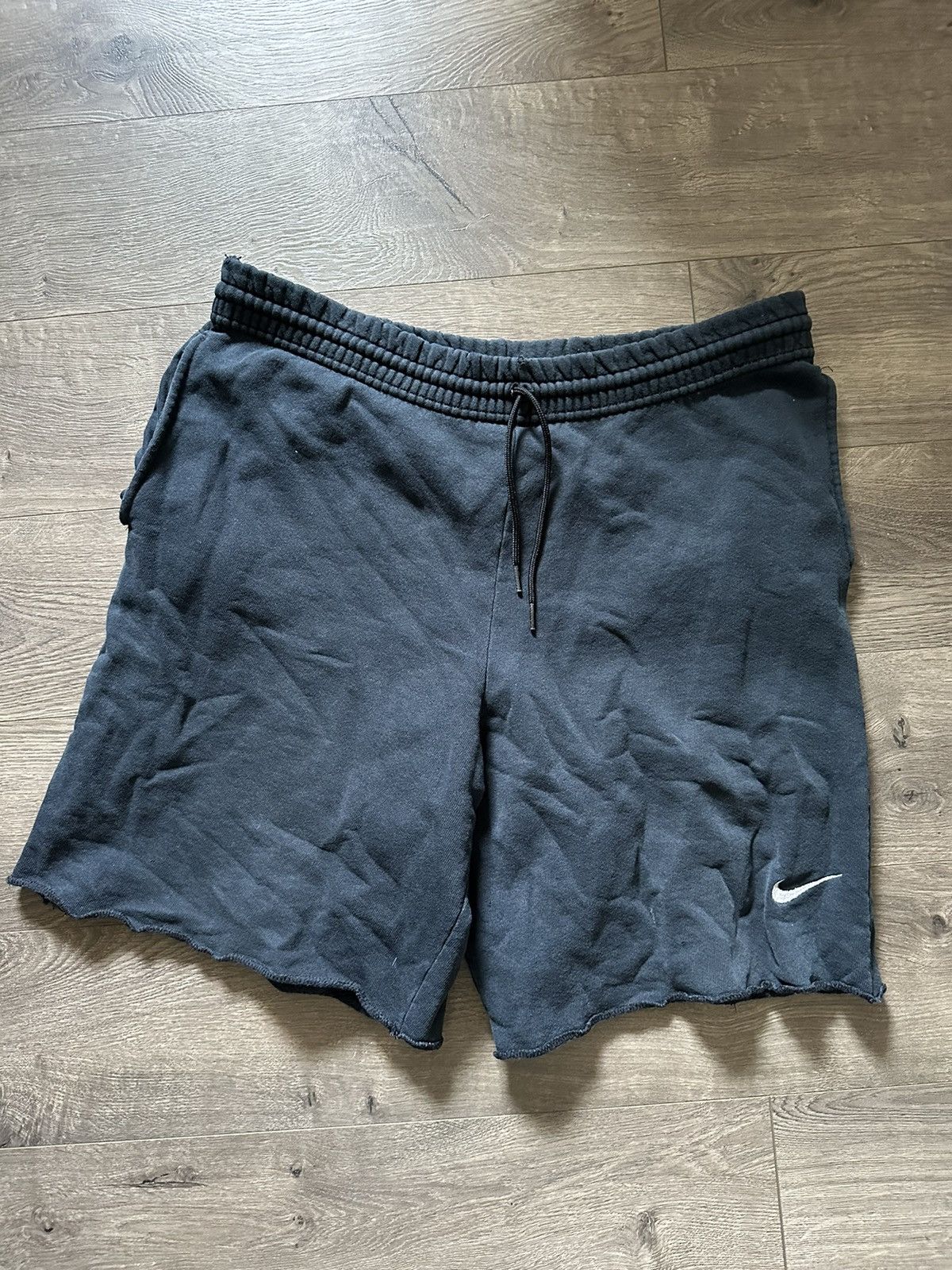 Nike cut off shorts discount