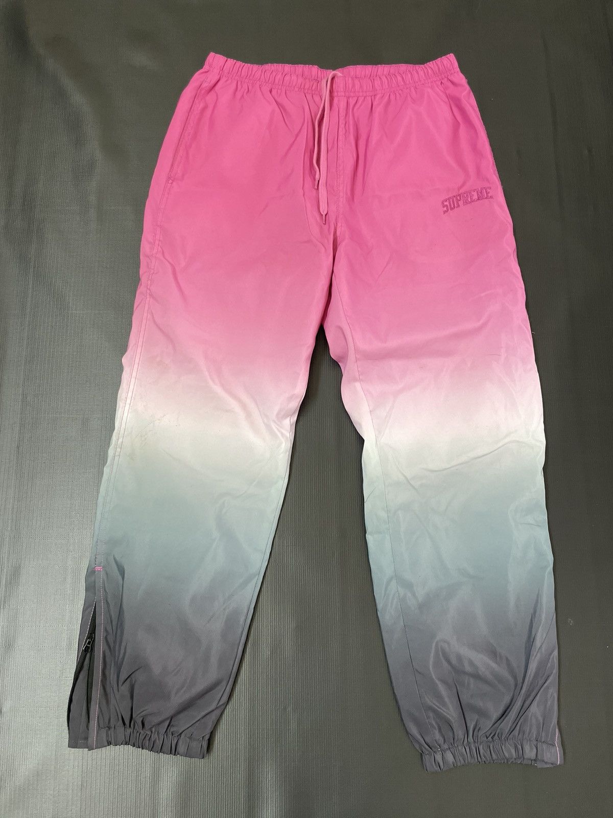 Supreme gradient track pants online