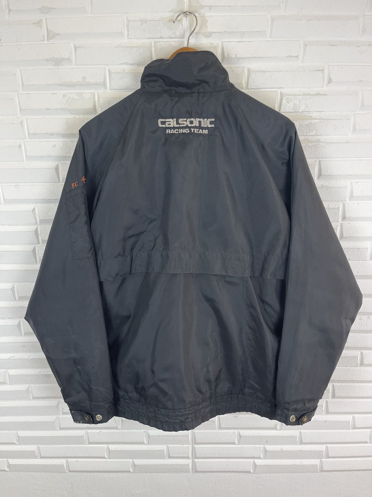 Nissan Vintage CALSONIC RACING TEAM GEAR JDM Size US M / EU 48-50 / 2 - 3 Thumbnail