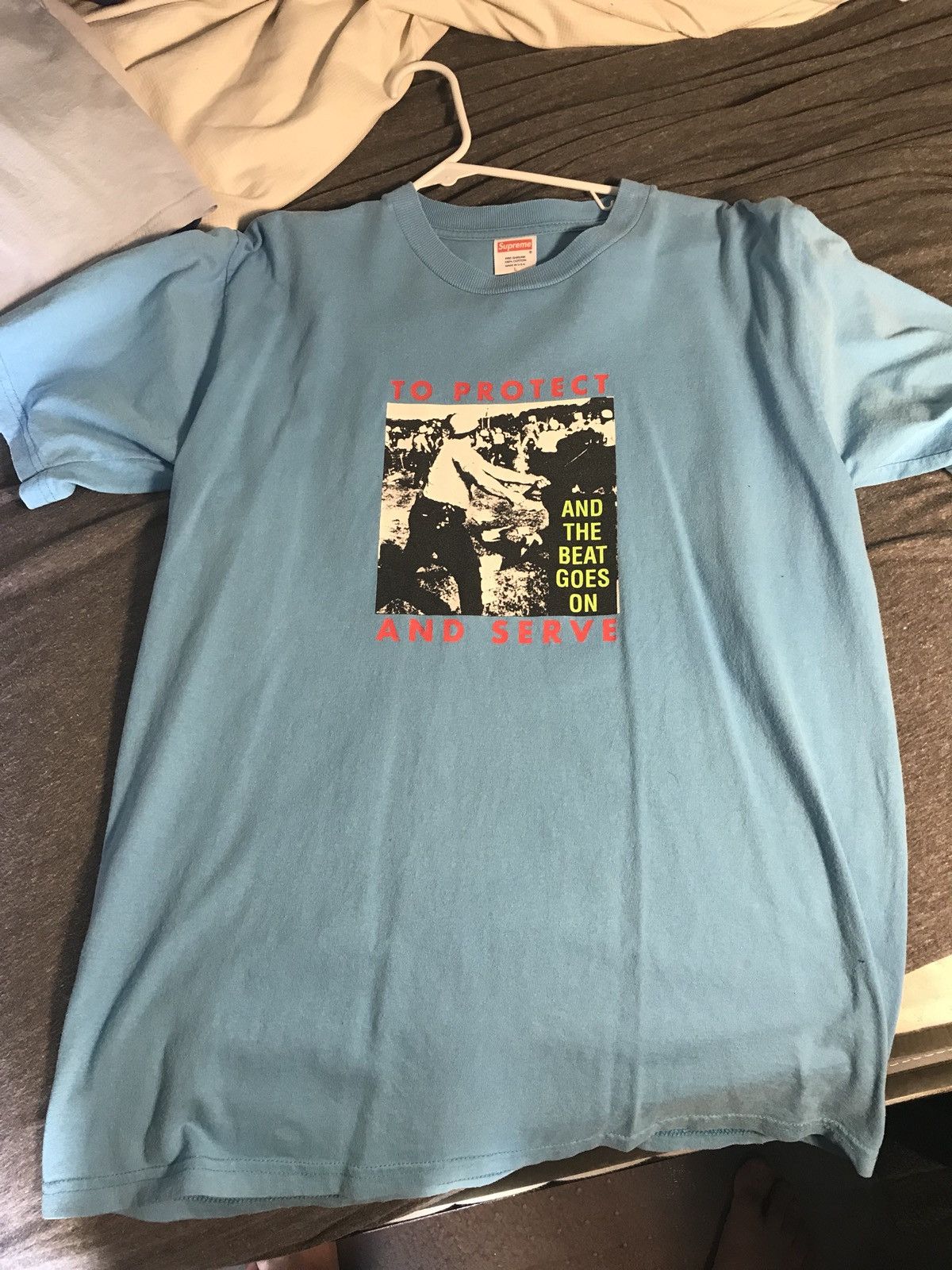 Supreme Supreme Protect and Serve Shirt | Grailed