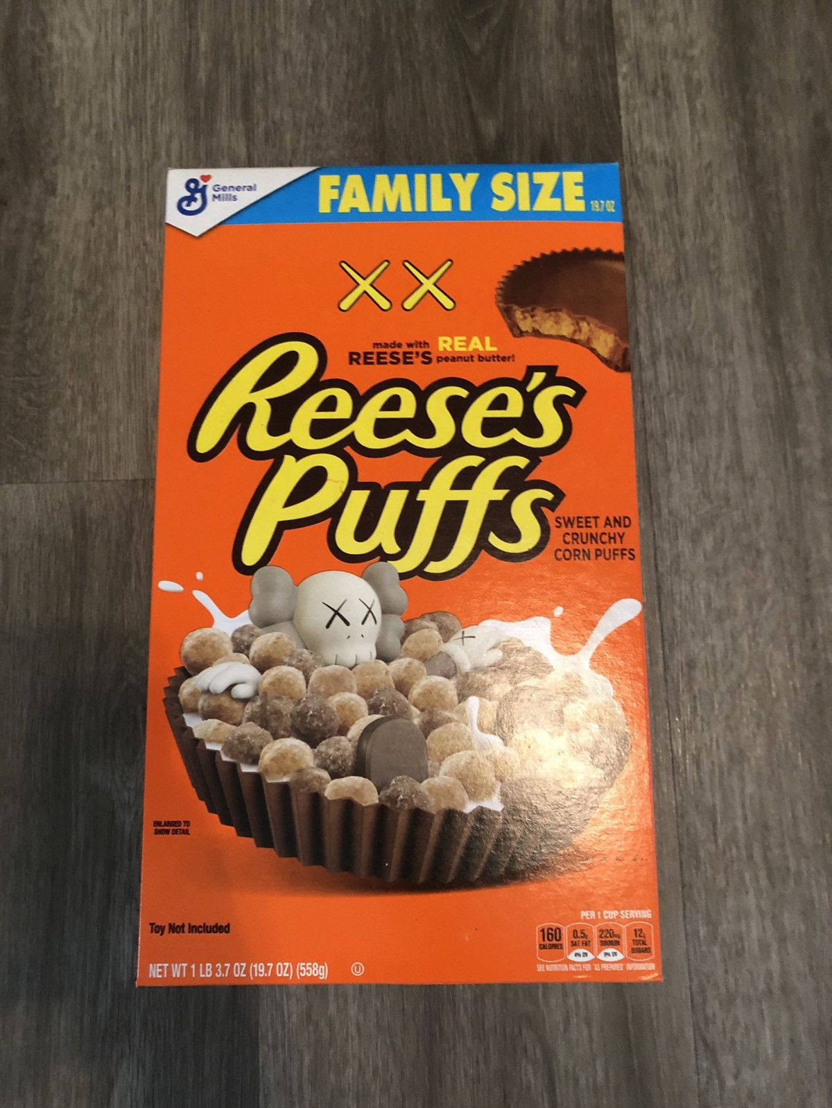 Jordan Brand 🔥KAWS x Reese's Puffs Limited addition cereal box | Grailed