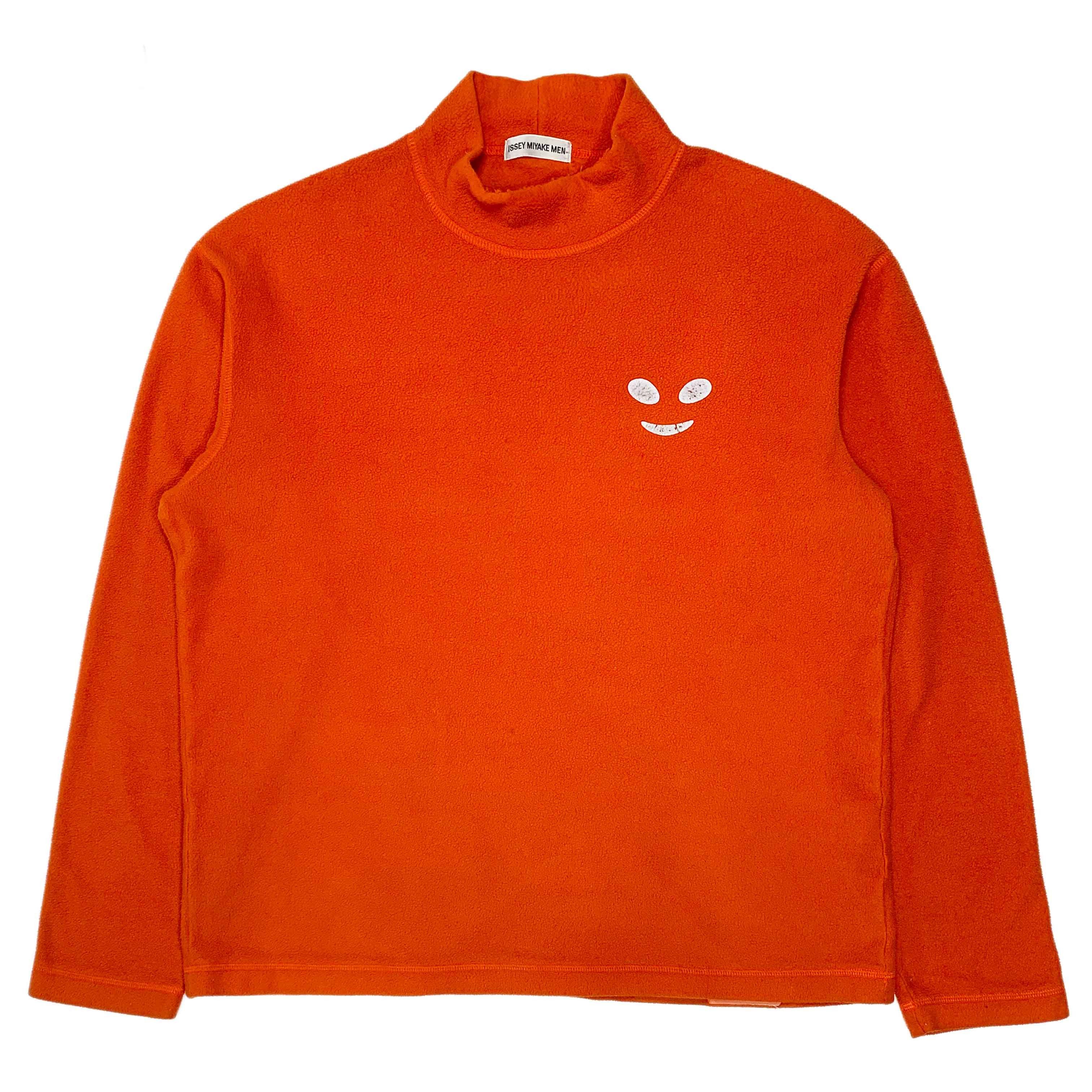 AW00 Reflective Grin Polar Fleece Sweater
