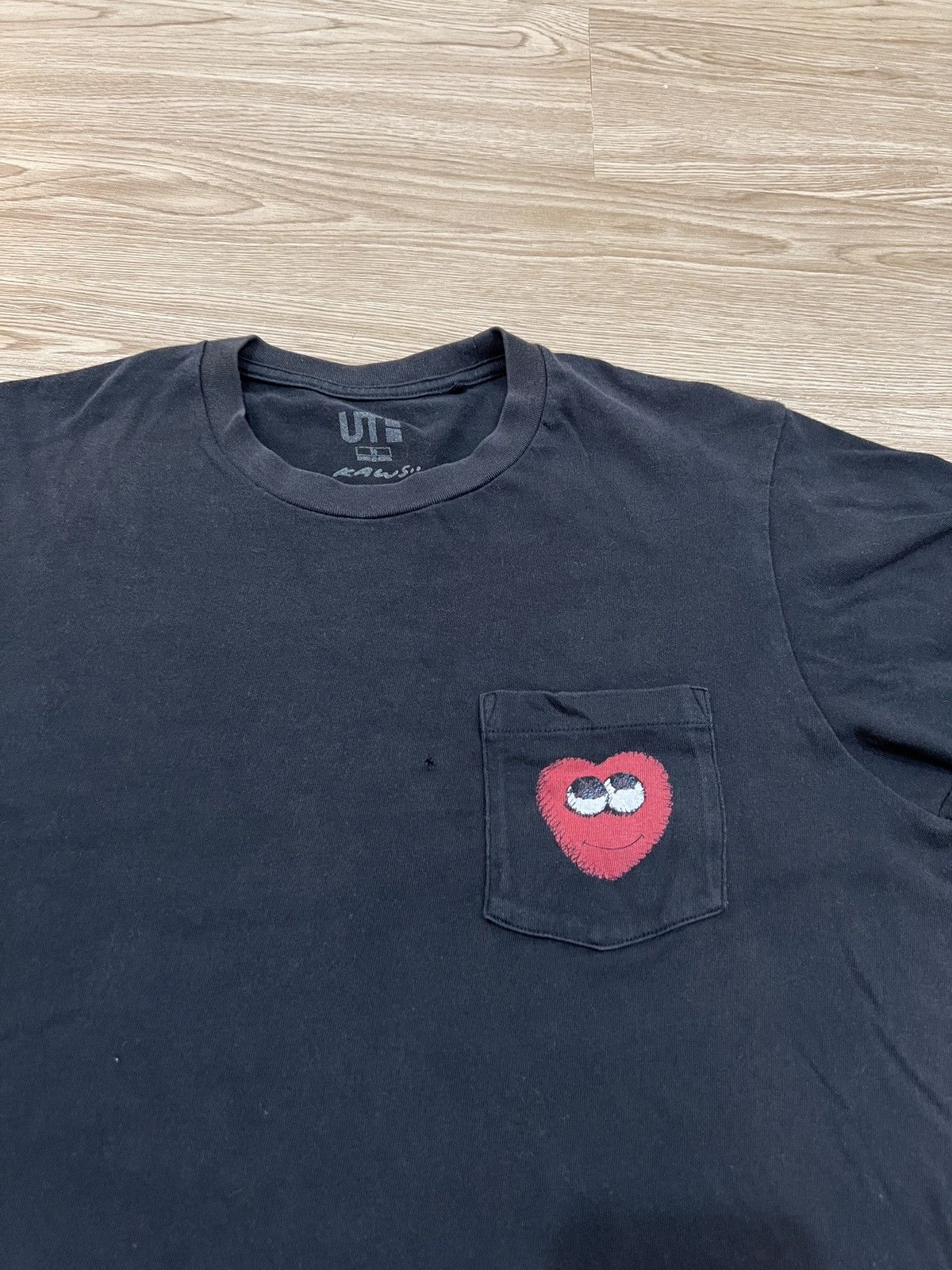Japanese Brand × Kaws × Uniqlo Kaws x Uniqlo Black Sun Faded Pocket T-Shirt Size US S / EU 44-46 / 1 - 3 Thumbnail