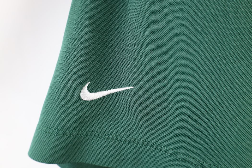 swoosh collared shirt
