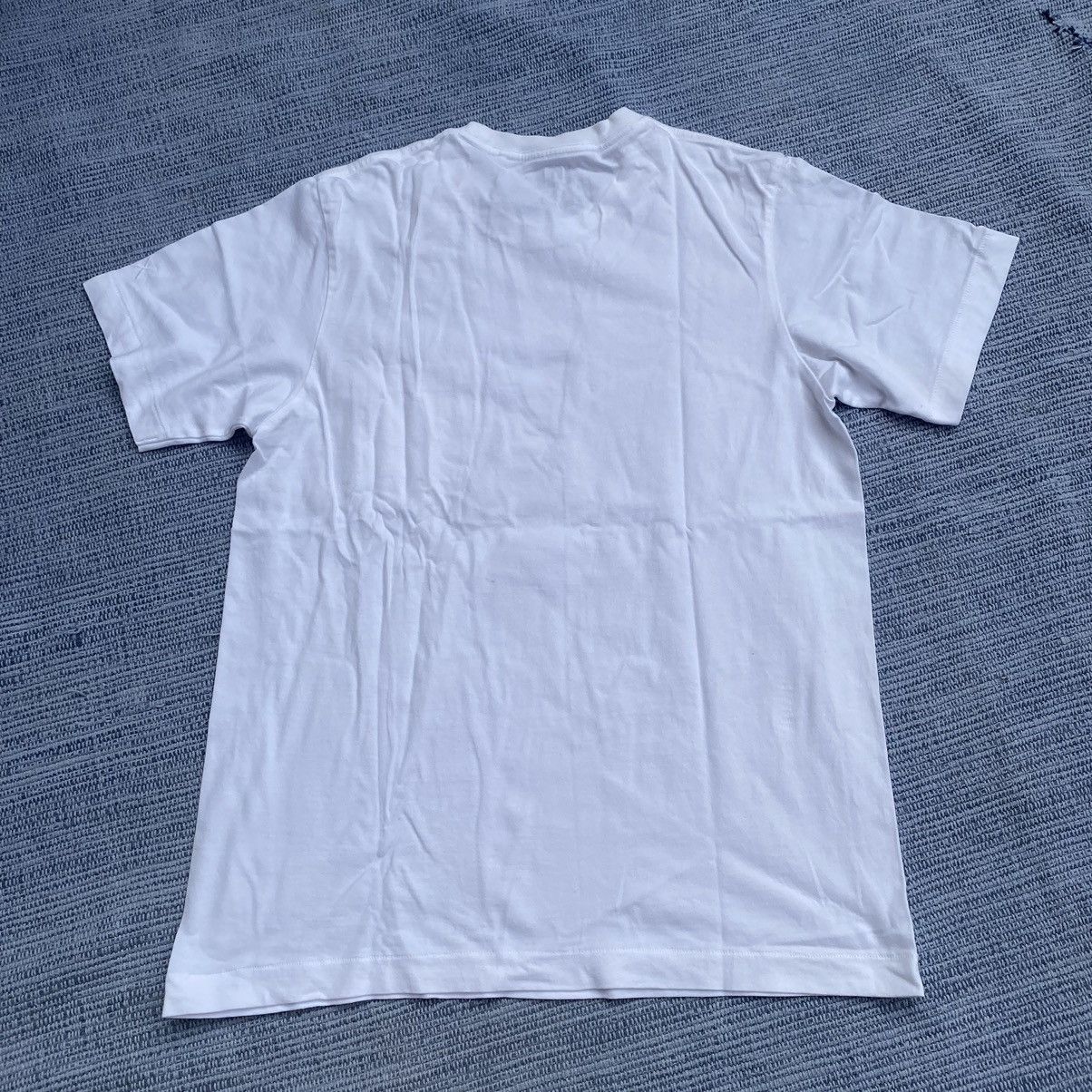 Kaws × Uniqlo pocket tee Size US M / EU 48-50 / 2 - 7 Thumbnail
