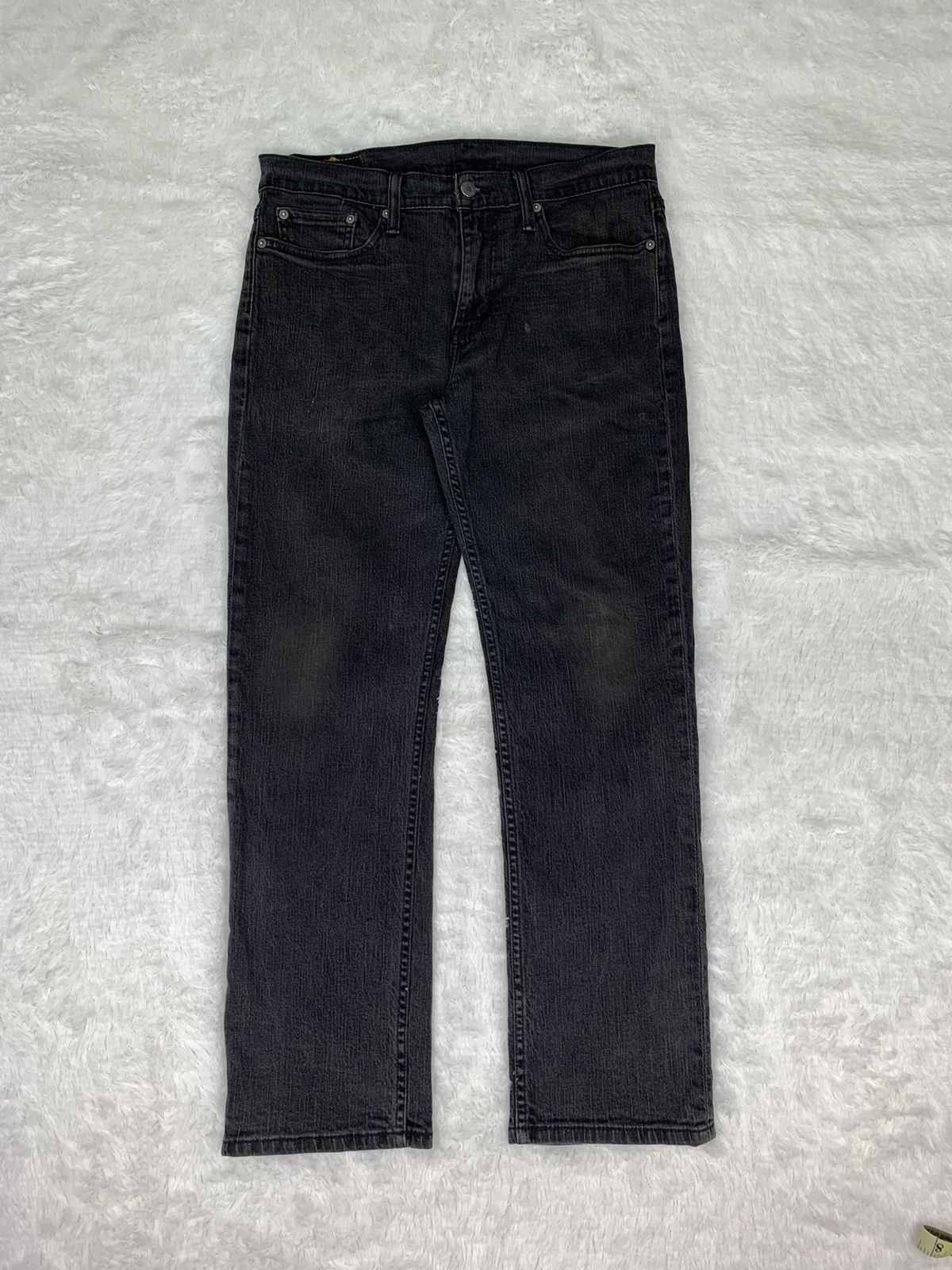 Vintage Levis 514 Faded Black Jeans.. size 33