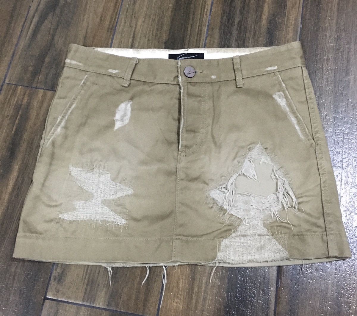 DISTRESSED KHAKI MINI SKIRT