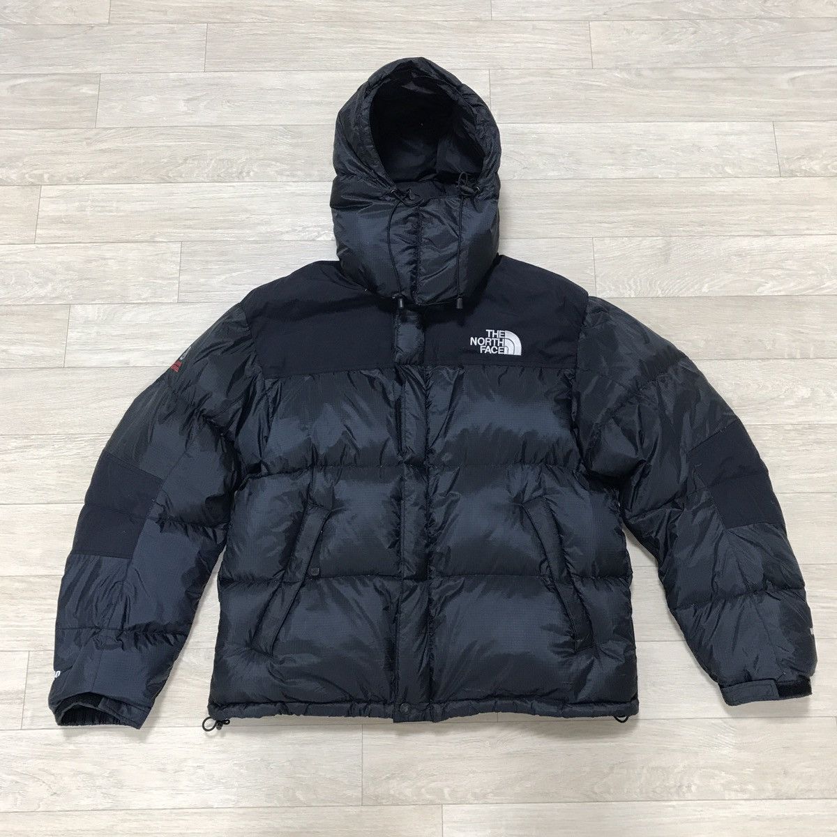 image of The North Face Baltoro 700 Puffer Jacket in Black, Men's (Size Medium)