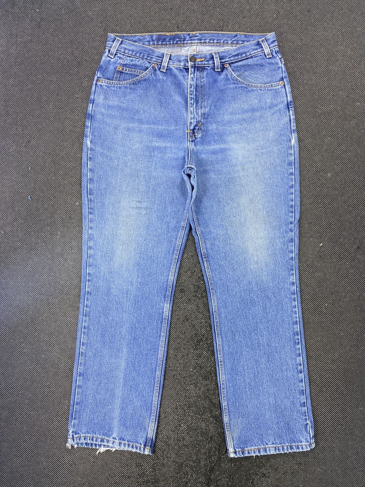 VINTAGE LEVIS ORANGE TAB BLUE WASH JEANS - J499